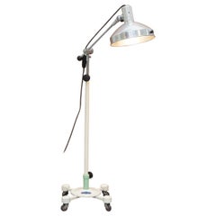 Used Midcentury Sol-Tan Industrial Articulated Floor Lamp and Original Heating Bulb