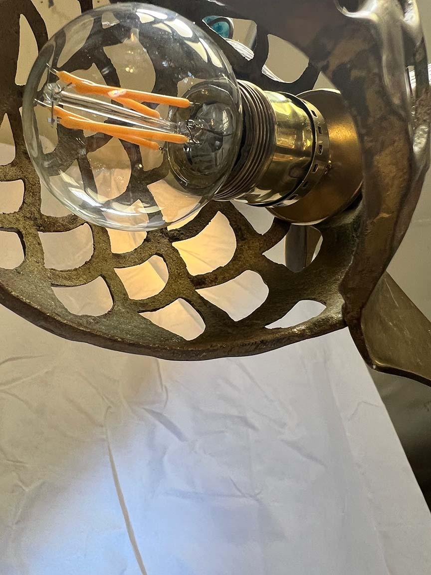 The solid brass Coy fish was originally a garden candle holder, circa 1965. This one has been uniquely converted to be a dry to damp location pendant light. Freshly wired with all UL certified parts, professionally done. Comes complete with mounting
