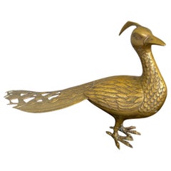 Pavone in ottone massiccio di metà secolo