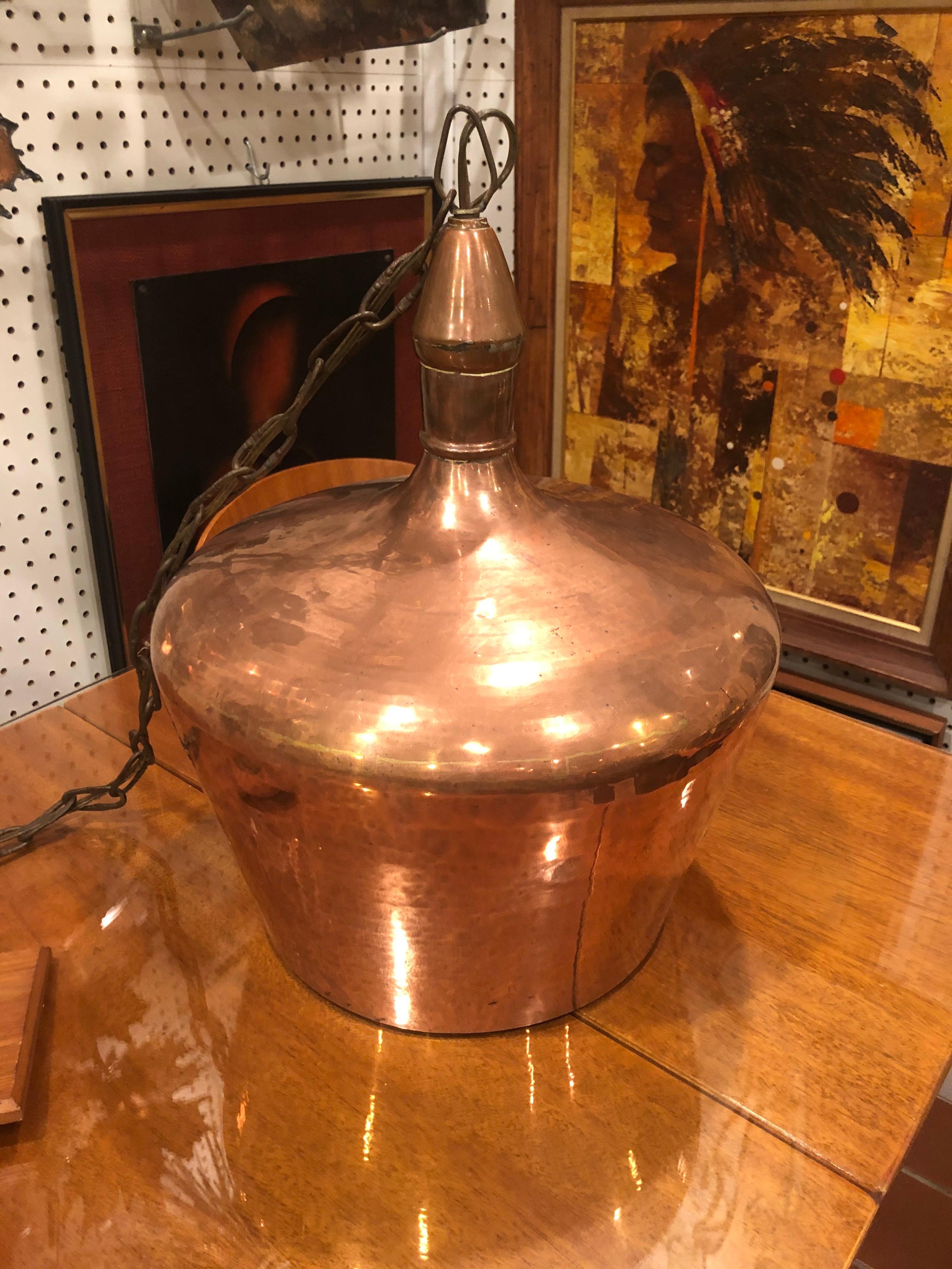Mid Century solid copper chandelier. Shiny clean patina. Perfect for that modern farmhouse or boho chic loft.
This item can parcel ship for $45
      
