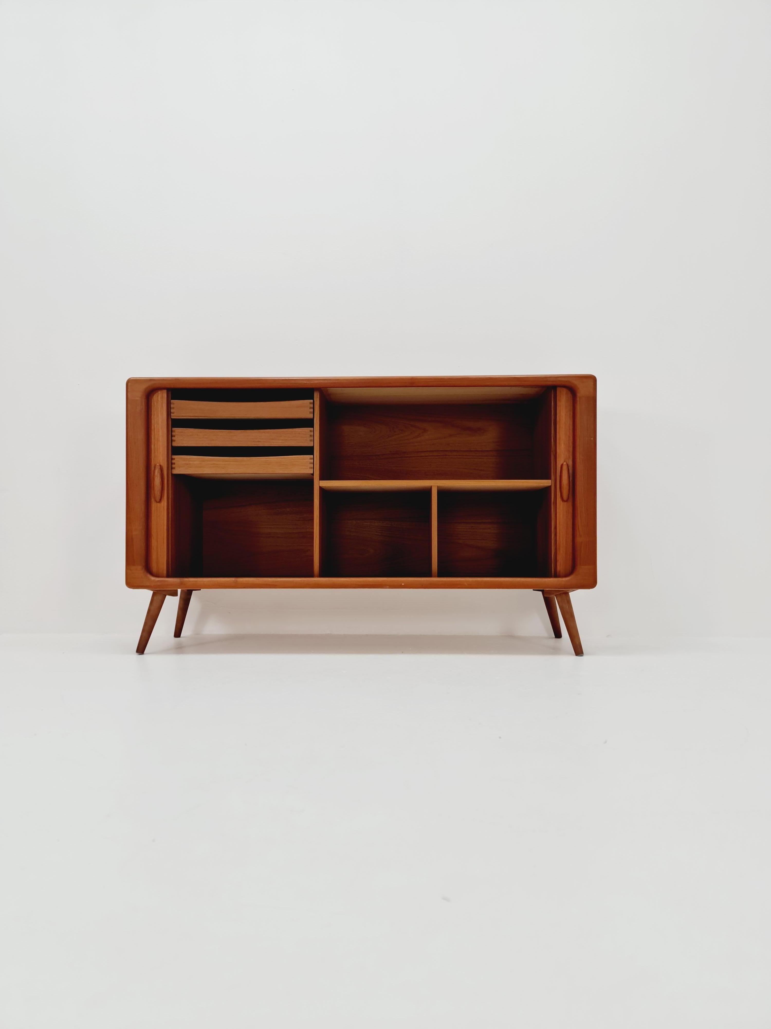 Mid century Solid Danish teak hallway cabinet, record cabinet By Dyrlund 1960s 

It is in good vintage condition, however, as with all vintage items some minor wear marks should be expected.

Design year: 1960s

Dimensions: : 52 x 120 W x 78 H