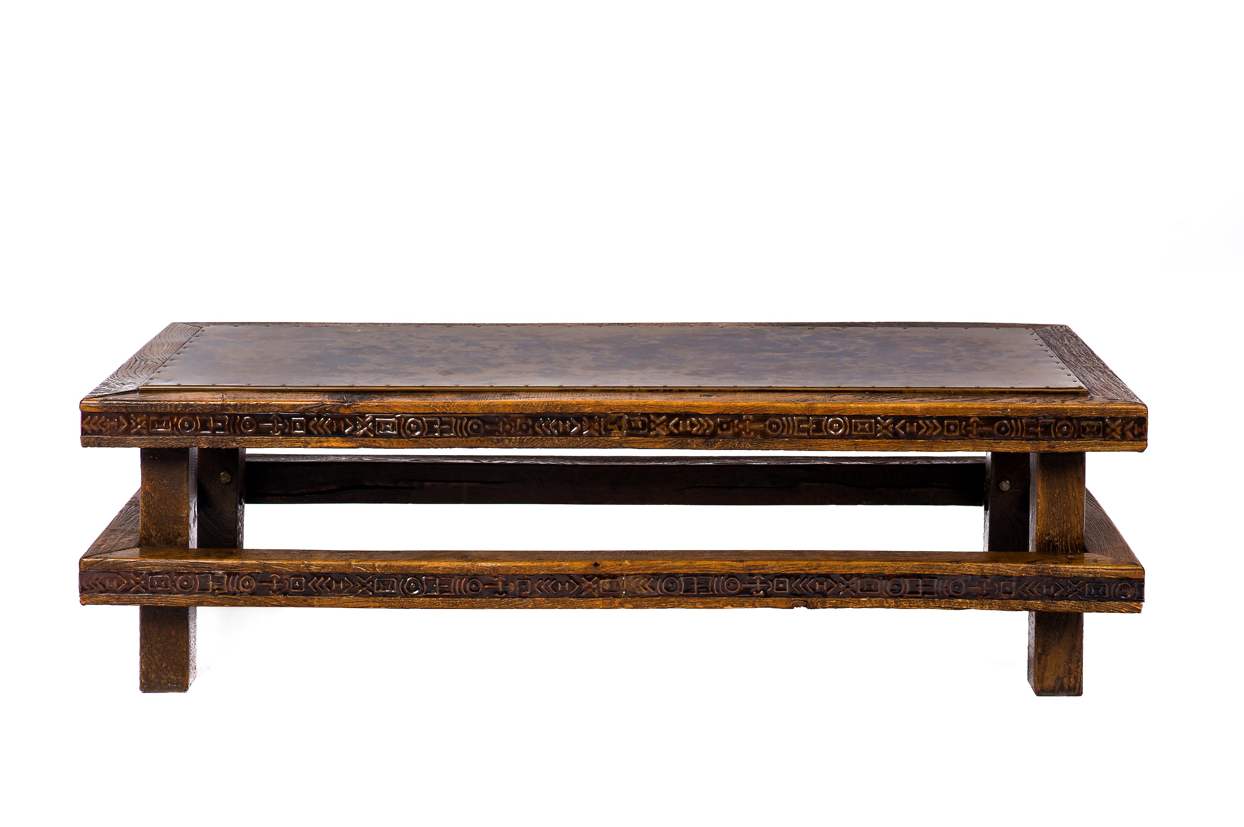 This beautiful midcentury Brutalist coffee table was made in the Netherlands circa 1960. The table has a relatively simple frame of solid square oak beams that are 2,8 x 2,8 inches. The beams were joined by lag bolts and are decorated with copper