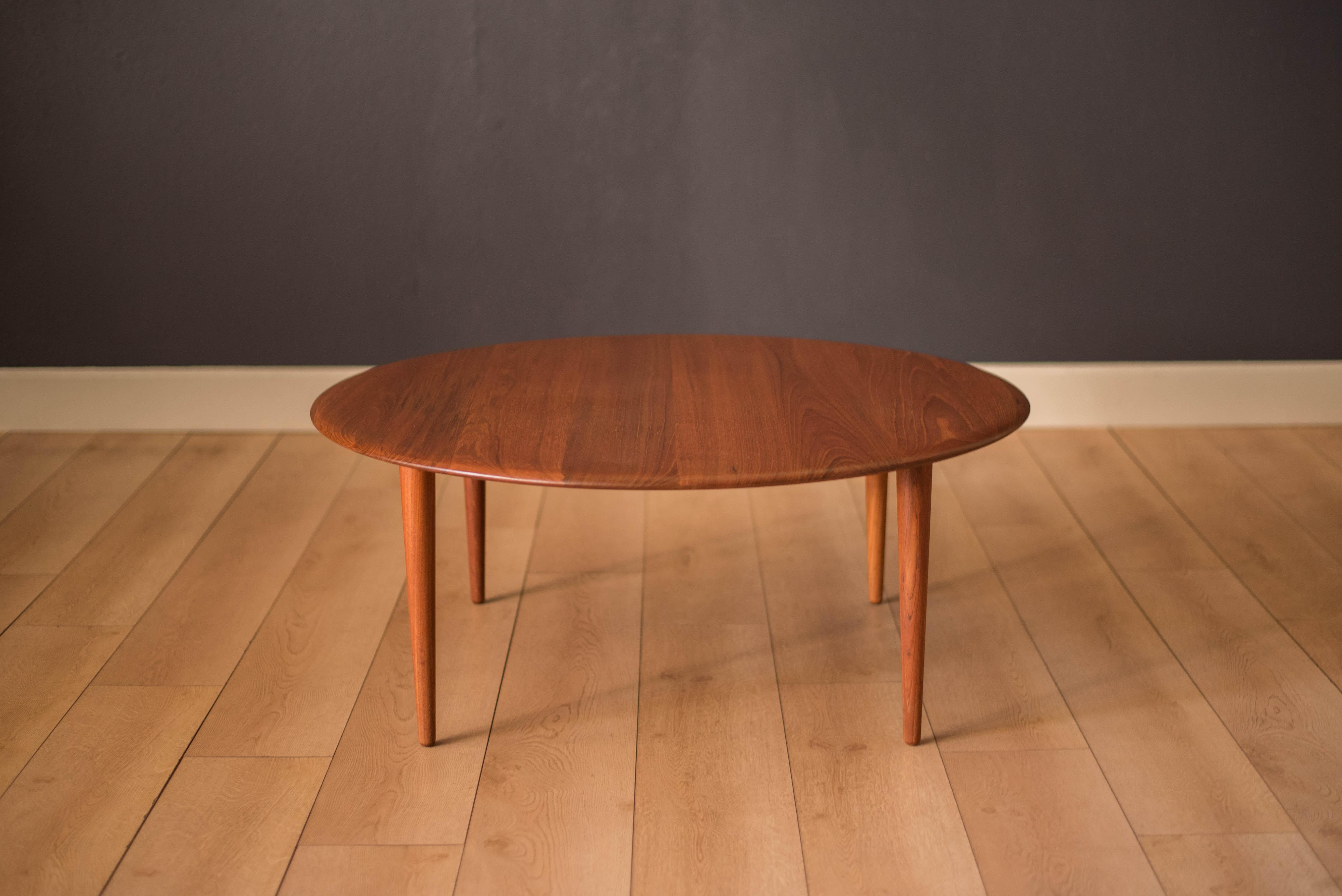 Vintage round coffee table model FD 515 designed by Peter Hvidt and Orla Mølgaard-Nielsen for France & Søn. This piece displays a low profile and is constructed of solid planked teak.



Offered by Mid Century Maddist
