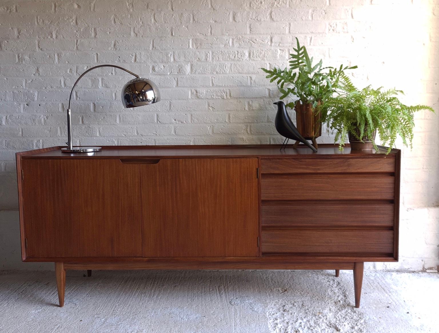 Midcentury Afromosia teak sideboard by Richard Hornby for Fyne Ladye, England, 1970s

Midcentury Afromosia teak sideboard by Richard Hornby for Fyne Ladye. Manufactured in the 1960s, from solid wood, 
and retailed through the renowned London