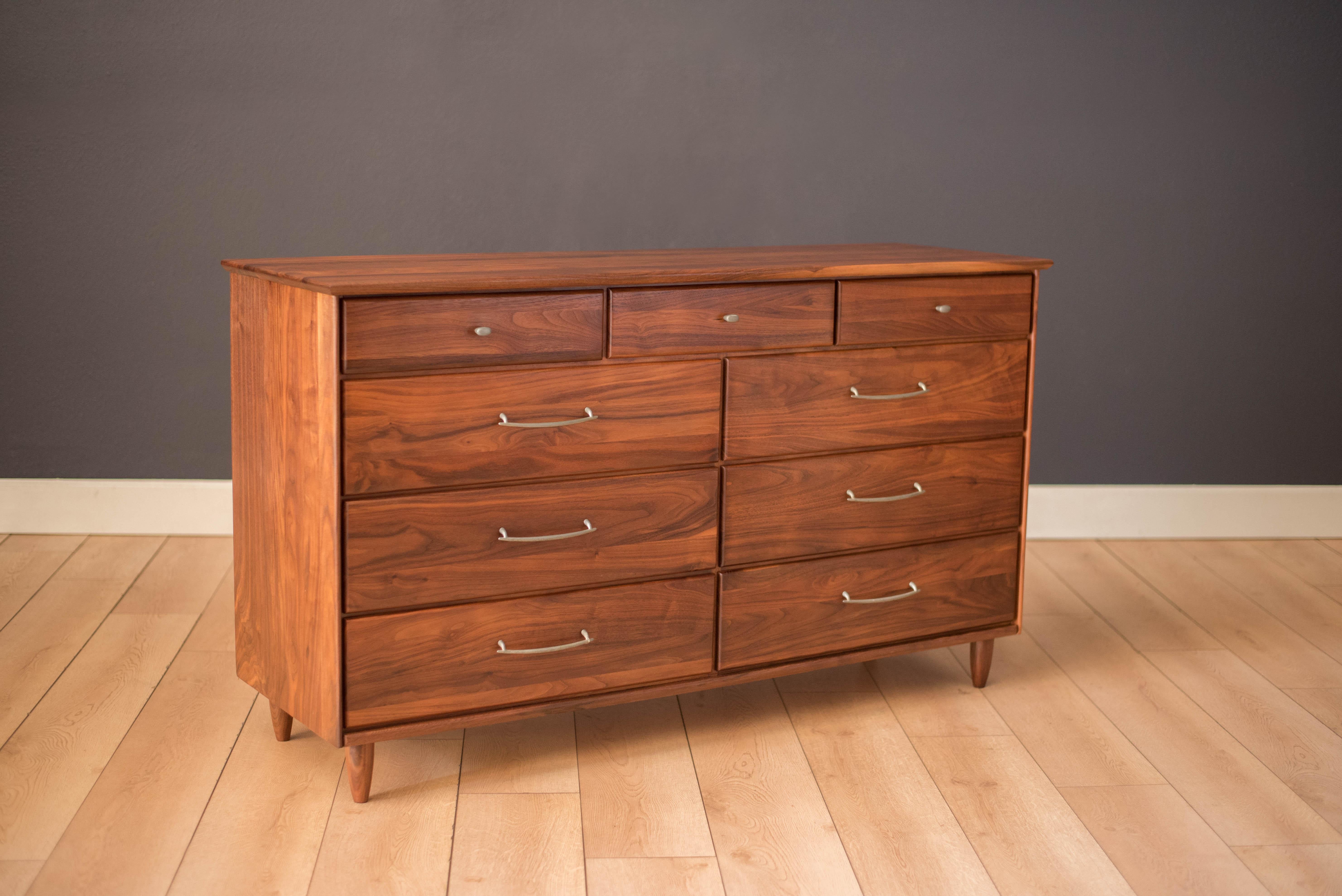 Vintage prelude dresser for ACE-HI Furniture in solid planked walnut. This piece offers plenty of storage and includes nine storage drawers accessorized with pewter pulls.



Offered by Mid Century Maddist

  