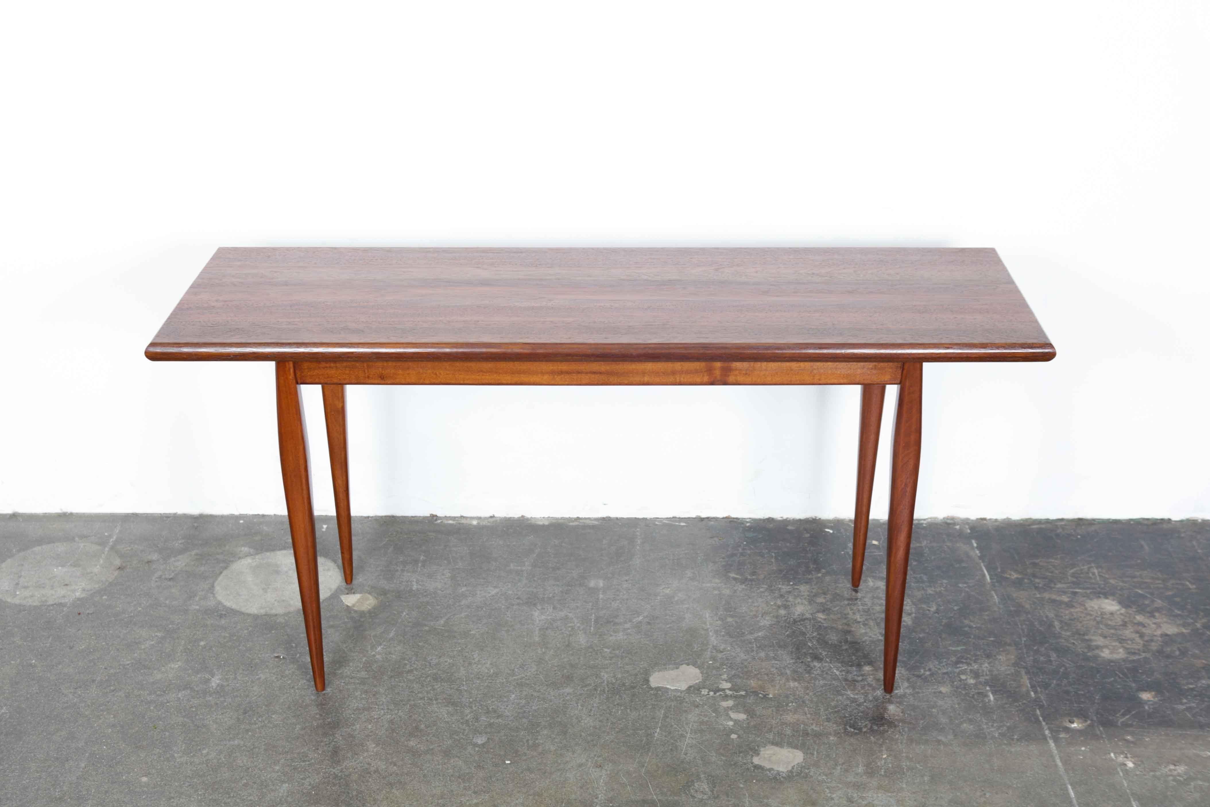 Brazilian 1960s solid wood console table or writing desk with tapering legs.