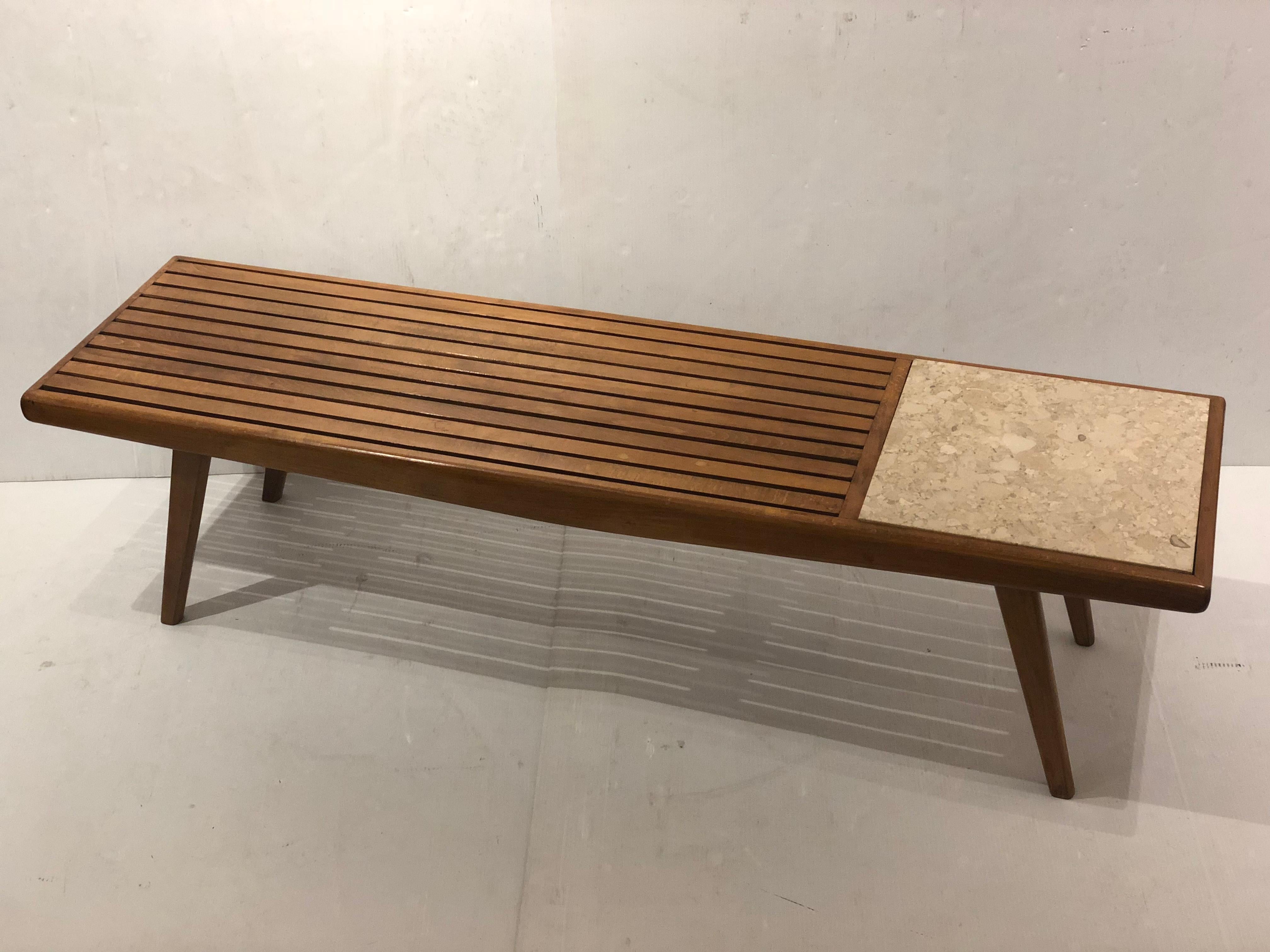 Elegant Japanese style small slat bench, circa 1950s, in light walnut finish. The piece is solid and sturdy with angle legs and solid marble insert. can be used for seating or as small coffee table. Retains its original walnut finish wich its very