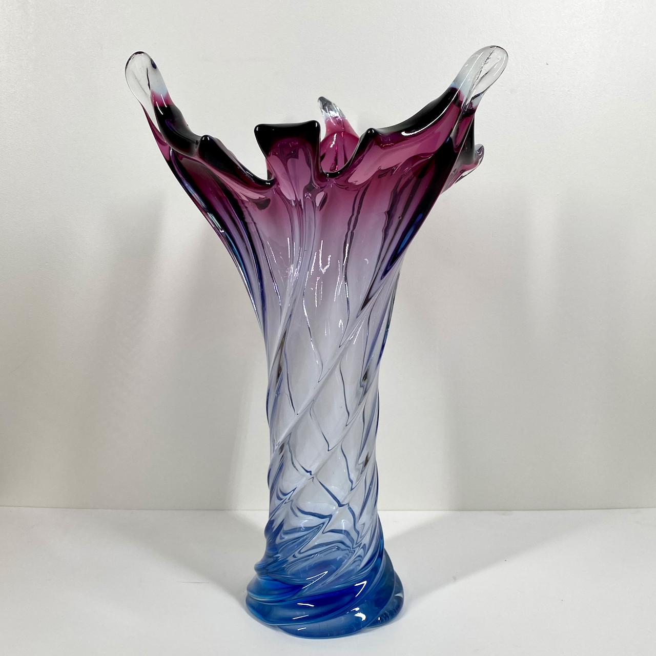 A Venetian organic glass sculpture vase, made on the island of Murano, near Venice, Italy.

Made in the sommerso technique. Common characteristics include a distinctive star shaped base, hot worked curled and cut out 