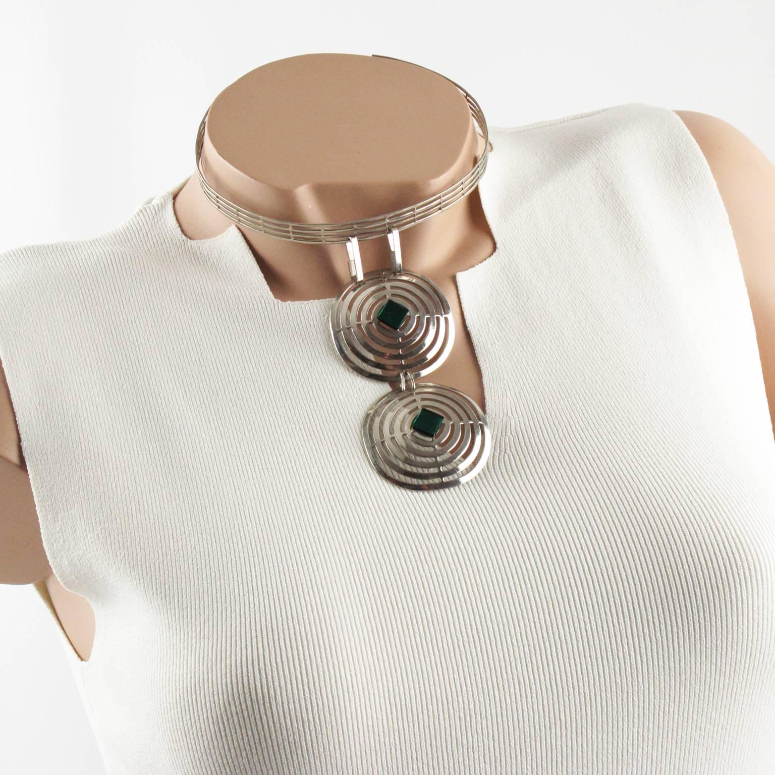 Stunning Mid Century minimalist Space Age dog collar necklace. Featuring a chromed metal rigid neck band with pierced and see thru carved pattern, ornate with a long geometric pendant. Two round domed discs with same carved pattern topped with