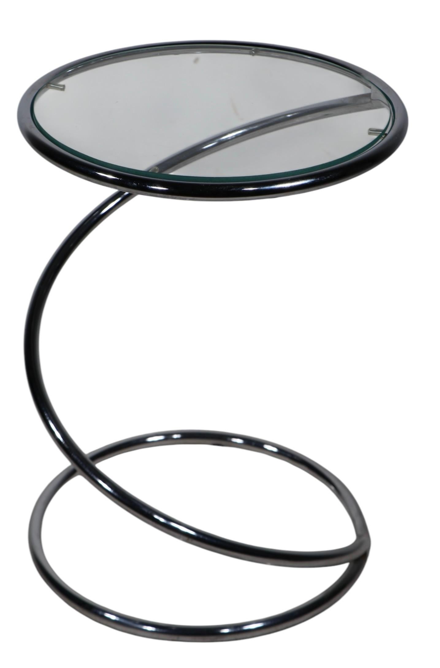 Classic coil spring base, glass top side, or end, table made by the Pace Furniture Co. circa 1970's. This example is in very good, clean, ready to use condition, showing only light cosmetic wear, normal and consistent with age. 