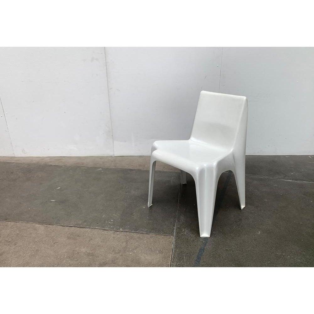 Bofinger stacking chair according to a design by Helmut Bätzner from the 1960s.

A design classic from the 1960s, which is particularly noticeable due to its organic design language with curves, folds and advanced and backing. Complex forms that
