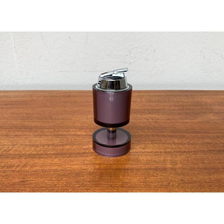 Mid-Century Space Age Table Lighter from Hadson from Angus Electronic, 1960s, in Very Good conditions. Designed 1960 to 1969 This piece has an attribution mark.

Additional information:
Materials: Metal, Plastic
Style: Mid-Century Modern
Color: