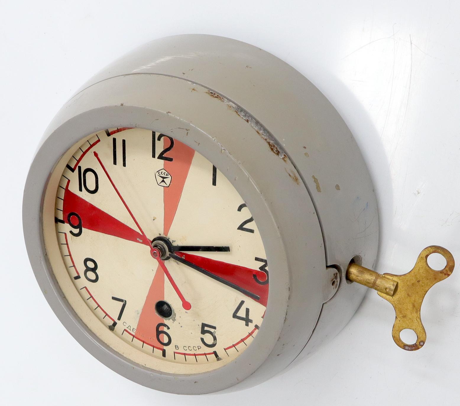 Vintage Space Age era heavy case with lock wall clock, circa 1960s-1970s made in USSR.