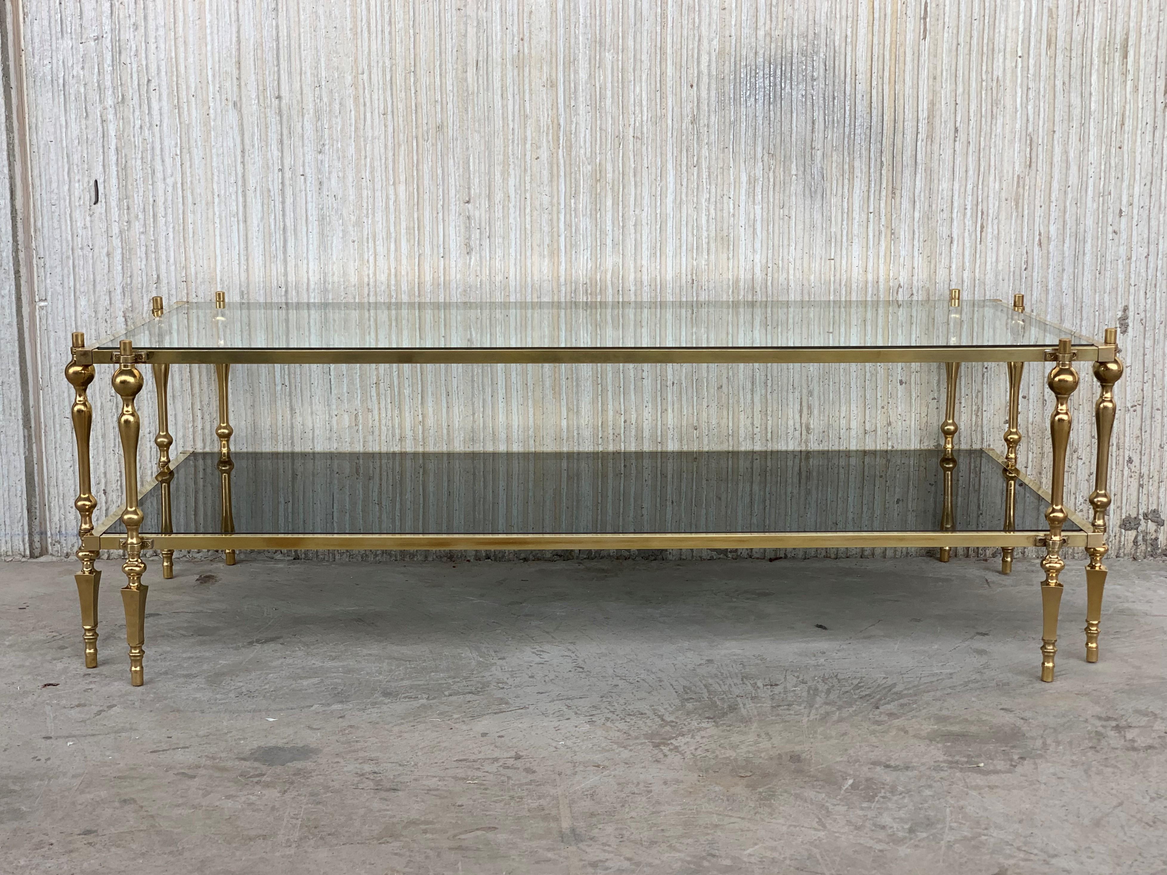 Mid-Century Modern Spanish brass and bronze coffee table with smoked low glass.