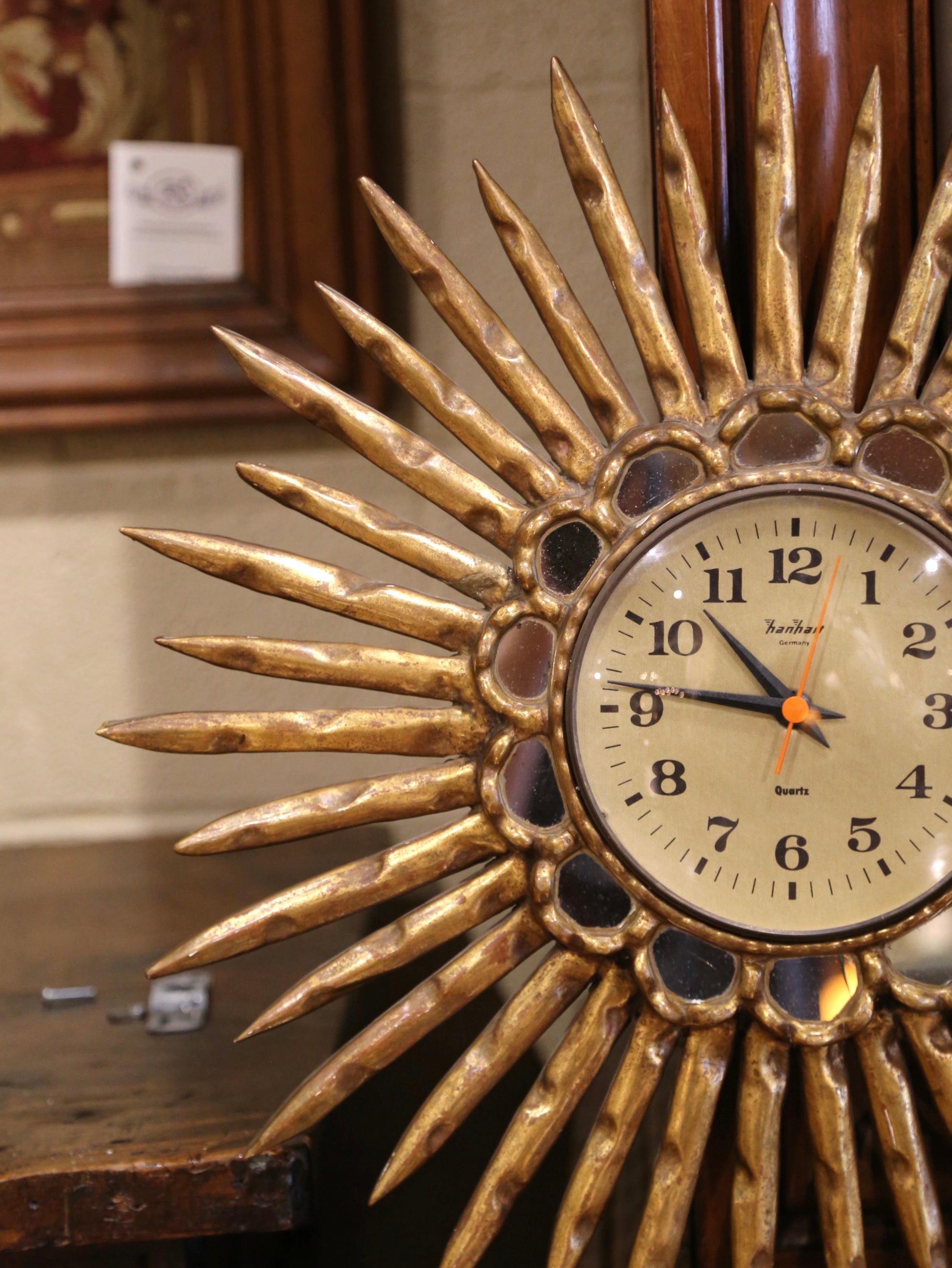 Hand-Carved Mid-Century Spanish Carved Giltwood Sunburst Wall Clock with Mirrored Insets For Sale