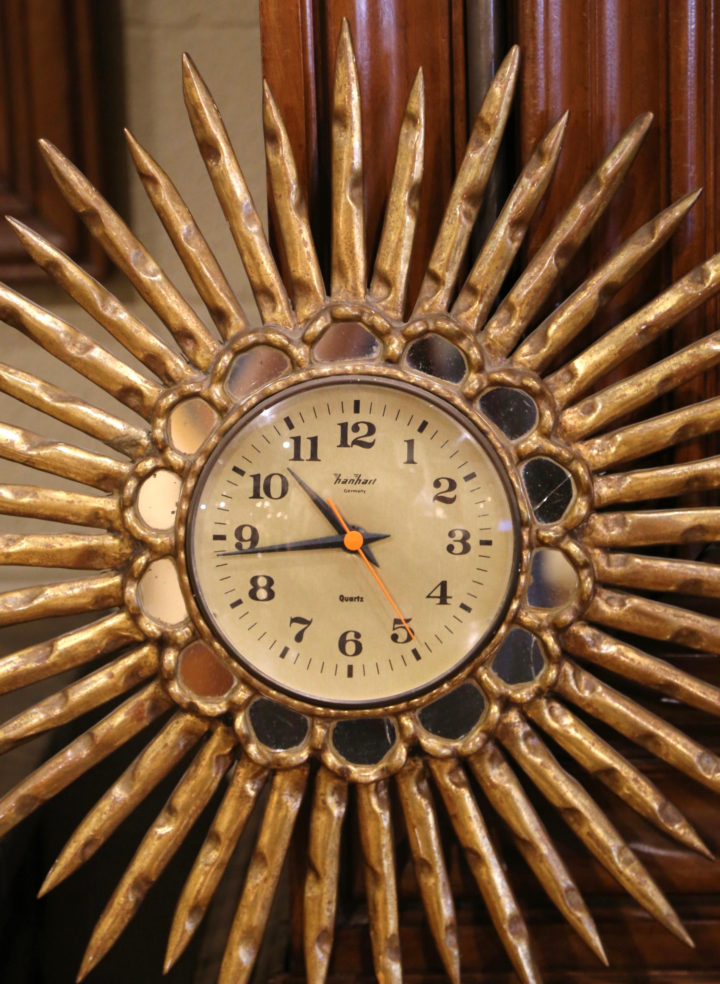 20th Century Mid-Century Spanish Carved Giltwood Sunburst Wall Clock with Mirrored Insets For Sale