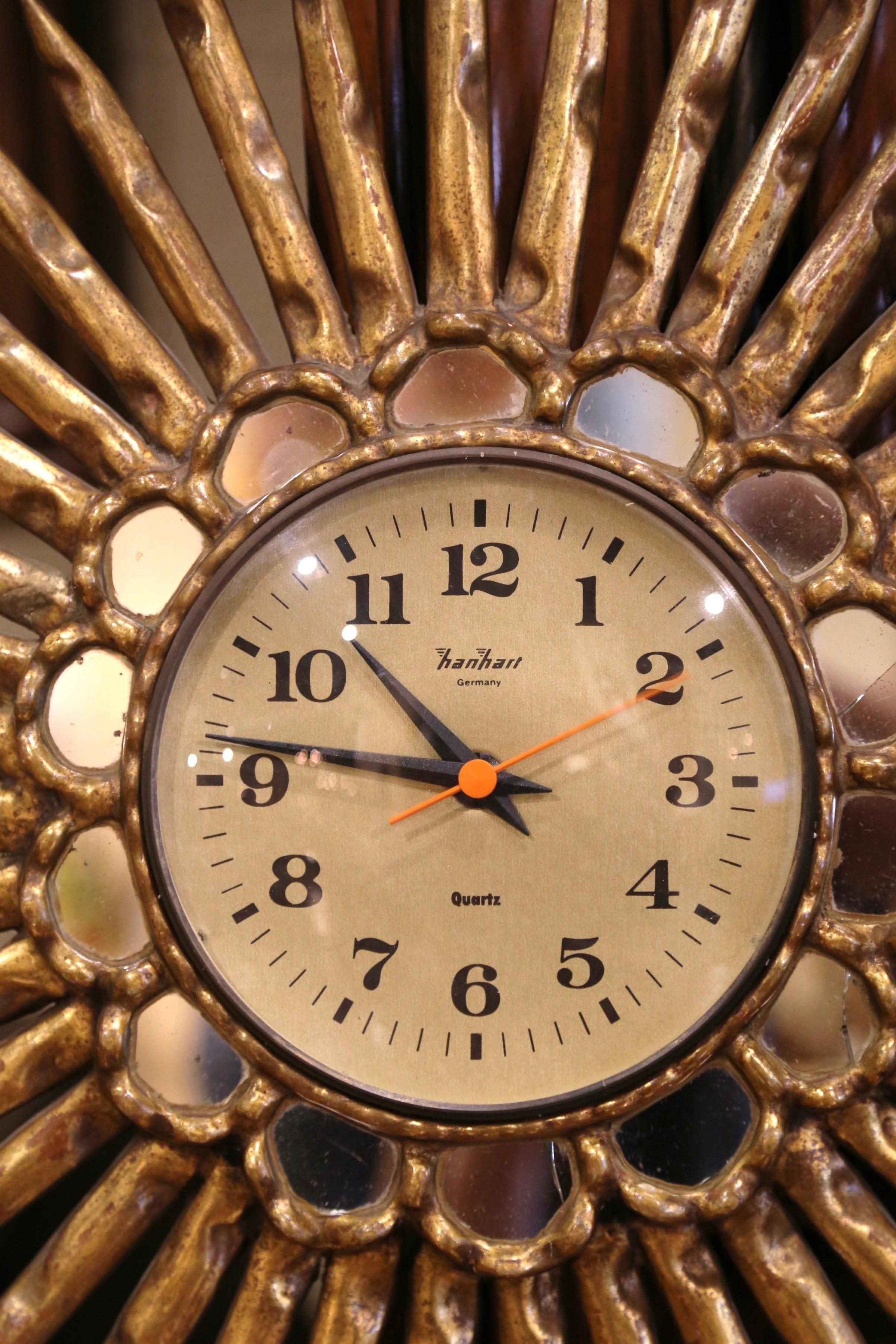 Mid-Century Spanish Carved Giltwood Sunburst Wall Clock with Mirrored Insets For Sale 1