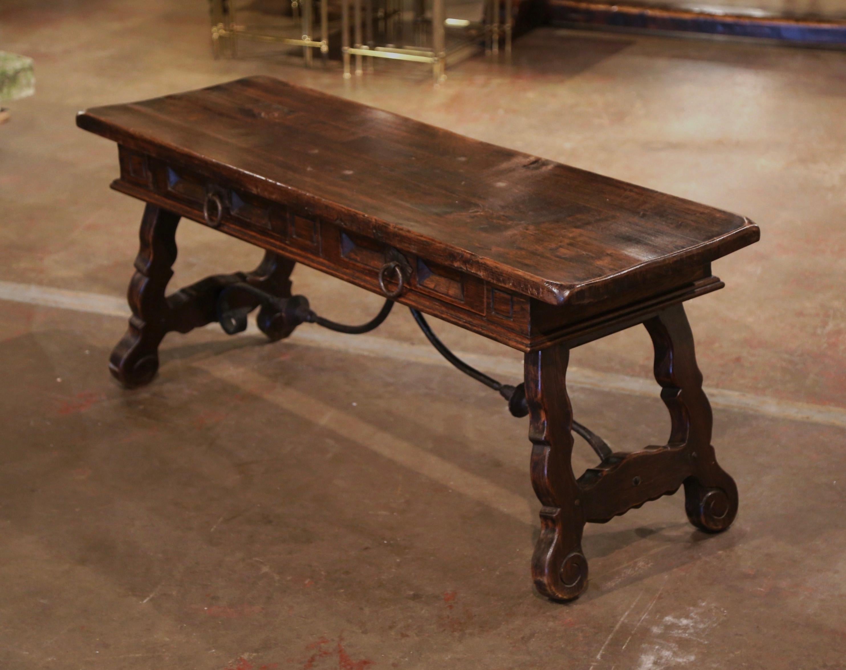 20th Century Mid-Century Spanish Carved Walnut Coffee Table with Iron Stretcher and Drawers