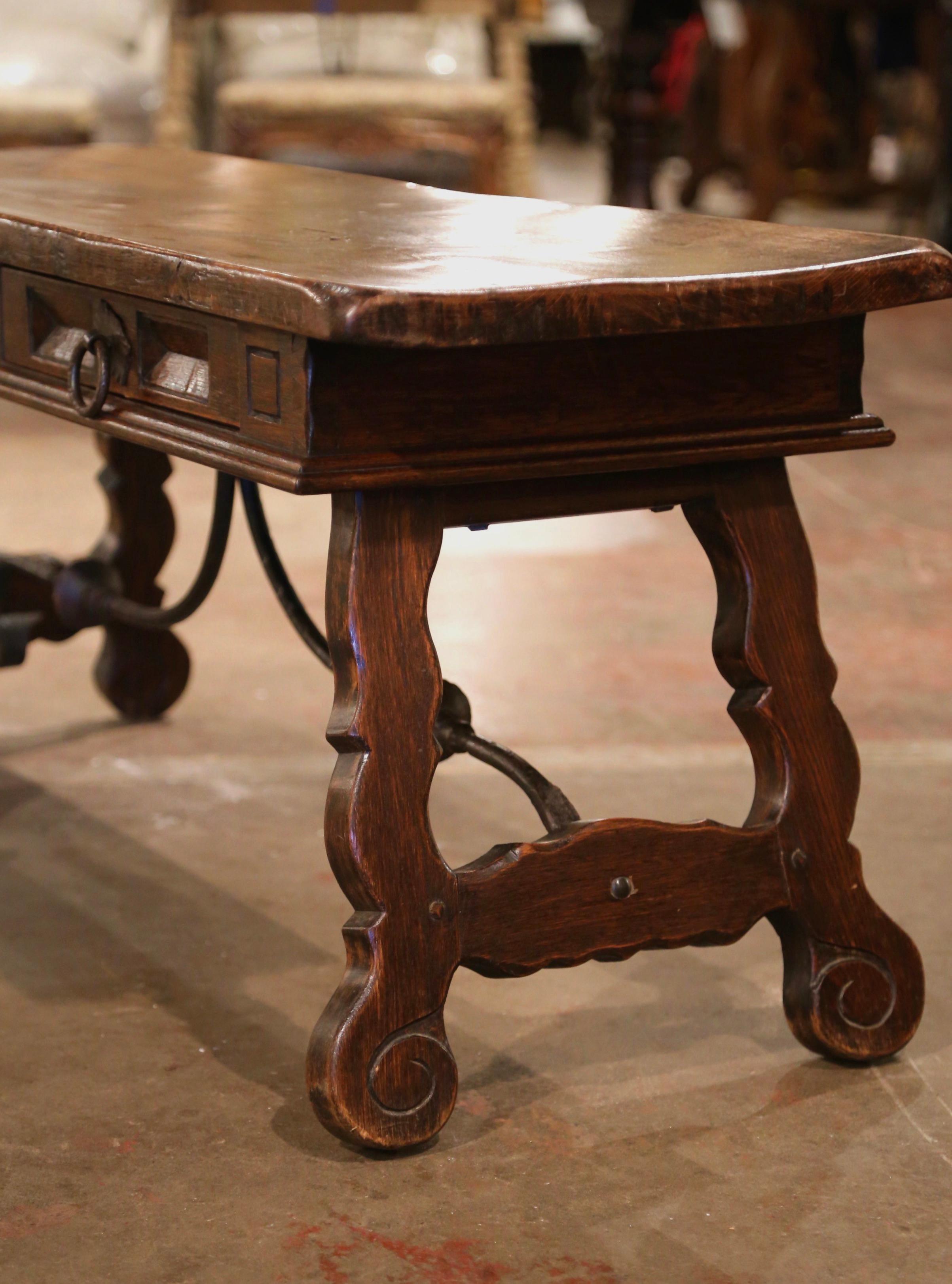 Wrought Iron Mid-Century Spanish Carved Walnut Coffee Table with Iron Stretcher and Drawers