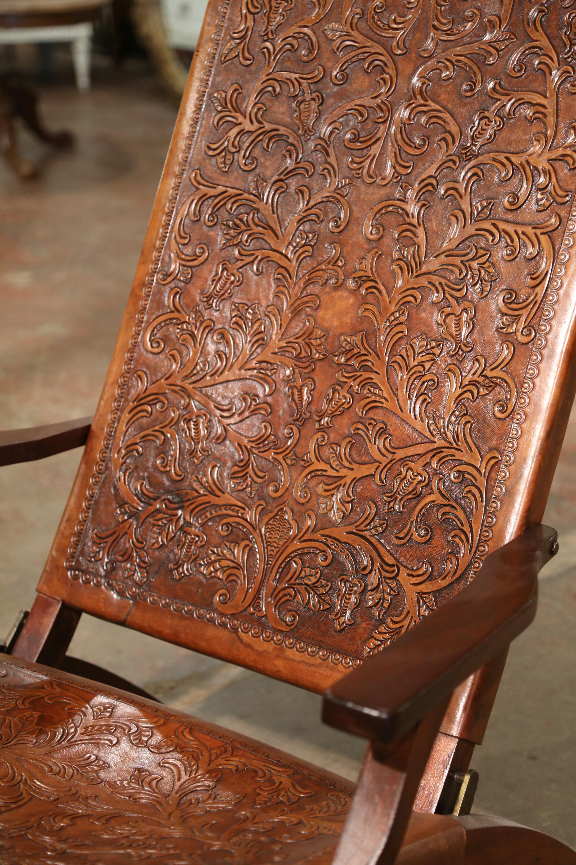 Hand-Carved Mid-Century Spanish Carved Walnut Folding Chair with Original Embossed Leather For Sale