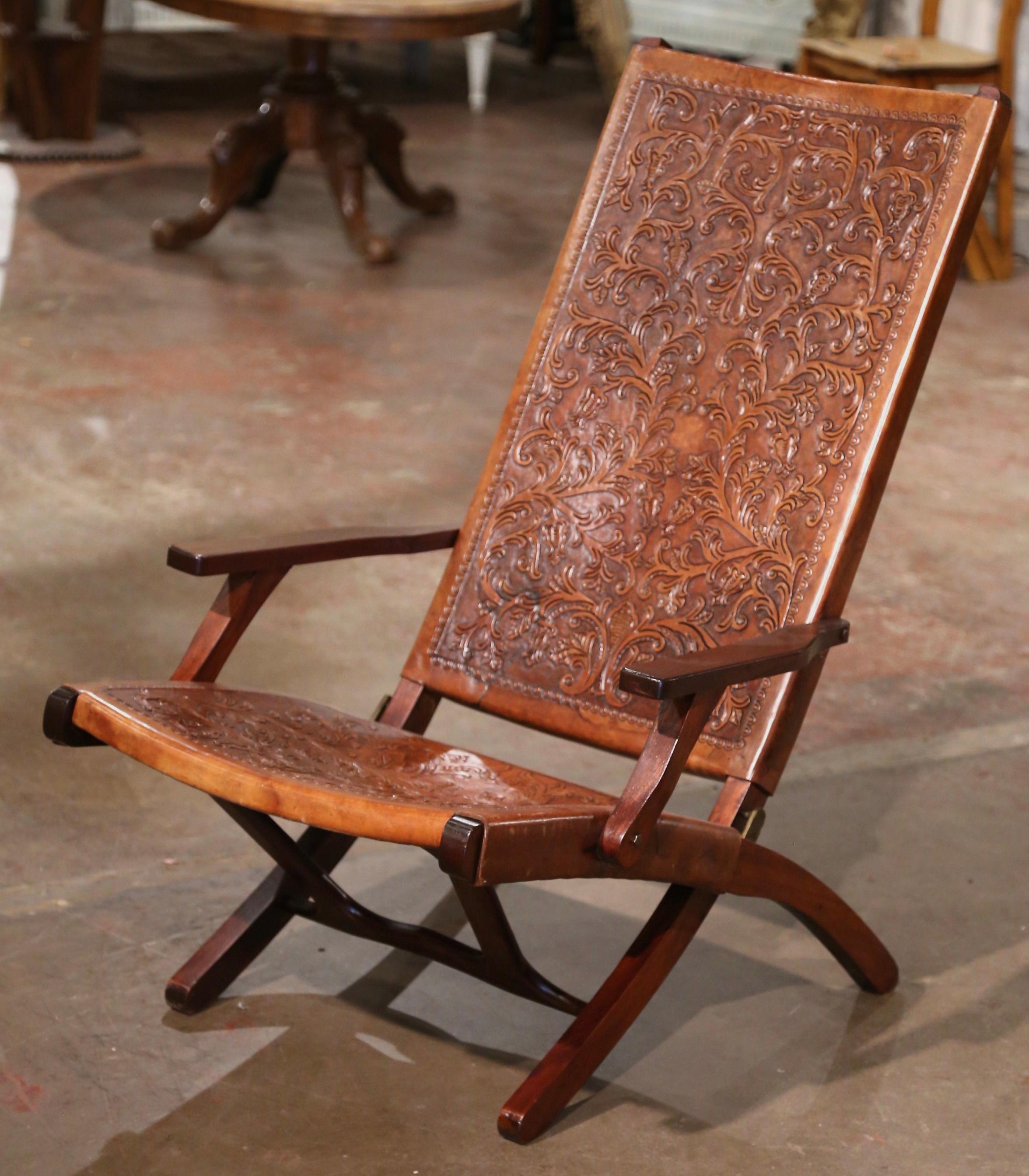 Mid-Century Spanish Carved Walnut Folding Chair with Original Embossed Leather In Excellent Condition For Sale In Dallas, TX