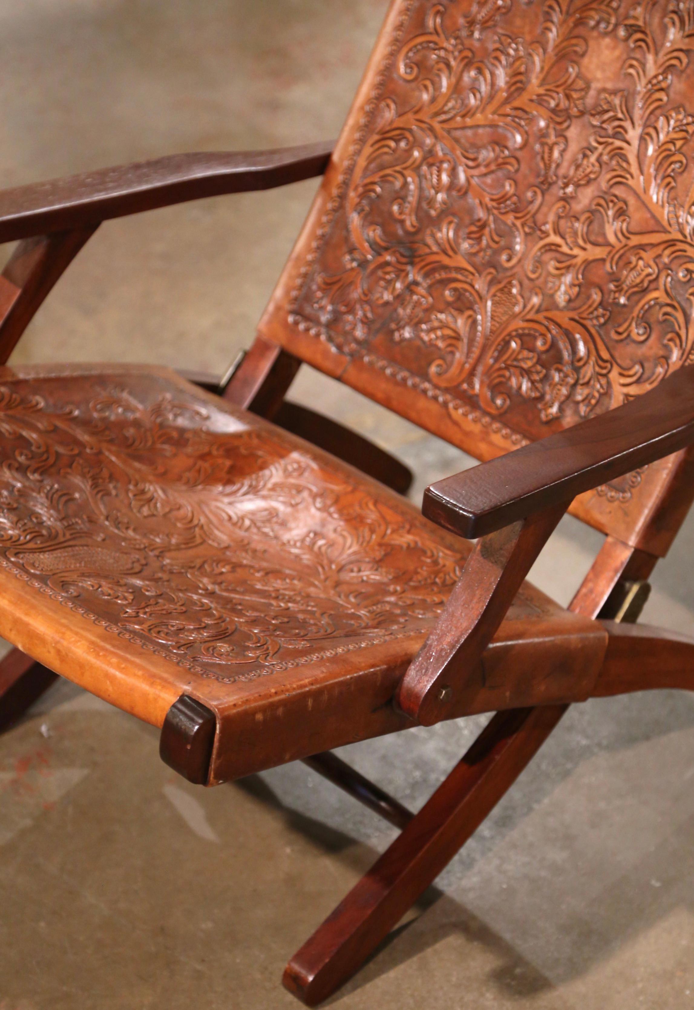 20th Century Mid-Century Spanish Carved Walnut Folding Chair with Original Embossed Leather For Sale
