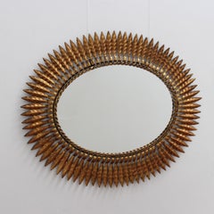 Mid-Century Spanish Gilt Metal Sunburst Mirror with Leaf Motif (circa 1960s)