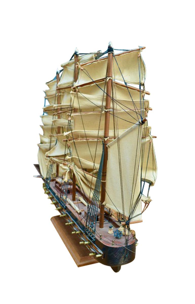 This  souvenir model of  a late 18 Century Sailing Frigate was crafted in Spain, circa 1950  and sits on an integral wooden base decorated with a small plaque which reads “Fragata Espanola   Ano 1780.” The model is crafted to replicate a real