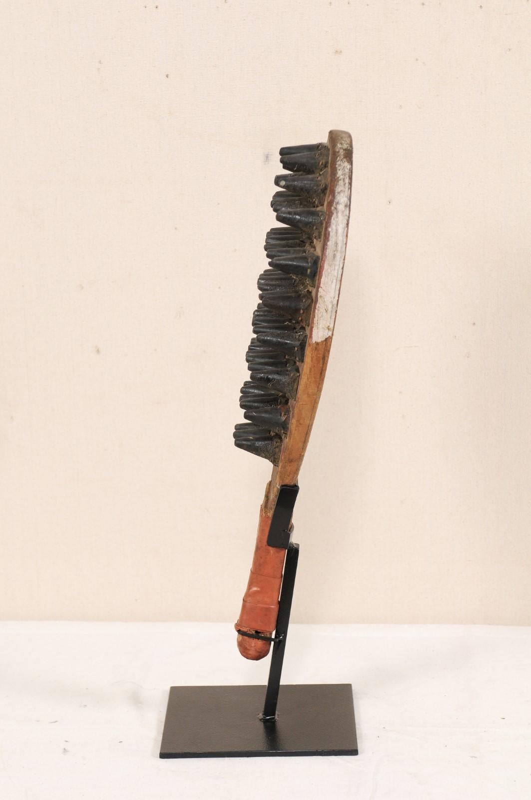 Midcentury Spiked Game Paddle on Stand from India In Good Condition For Sale In Atlanta, GA