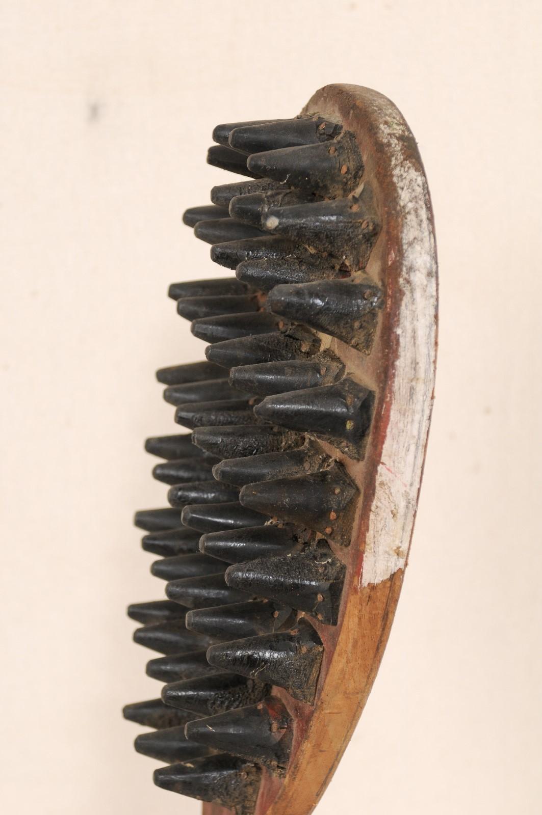 20th Century Midcentury Spiked Game Paddle on Stand from India For Sale