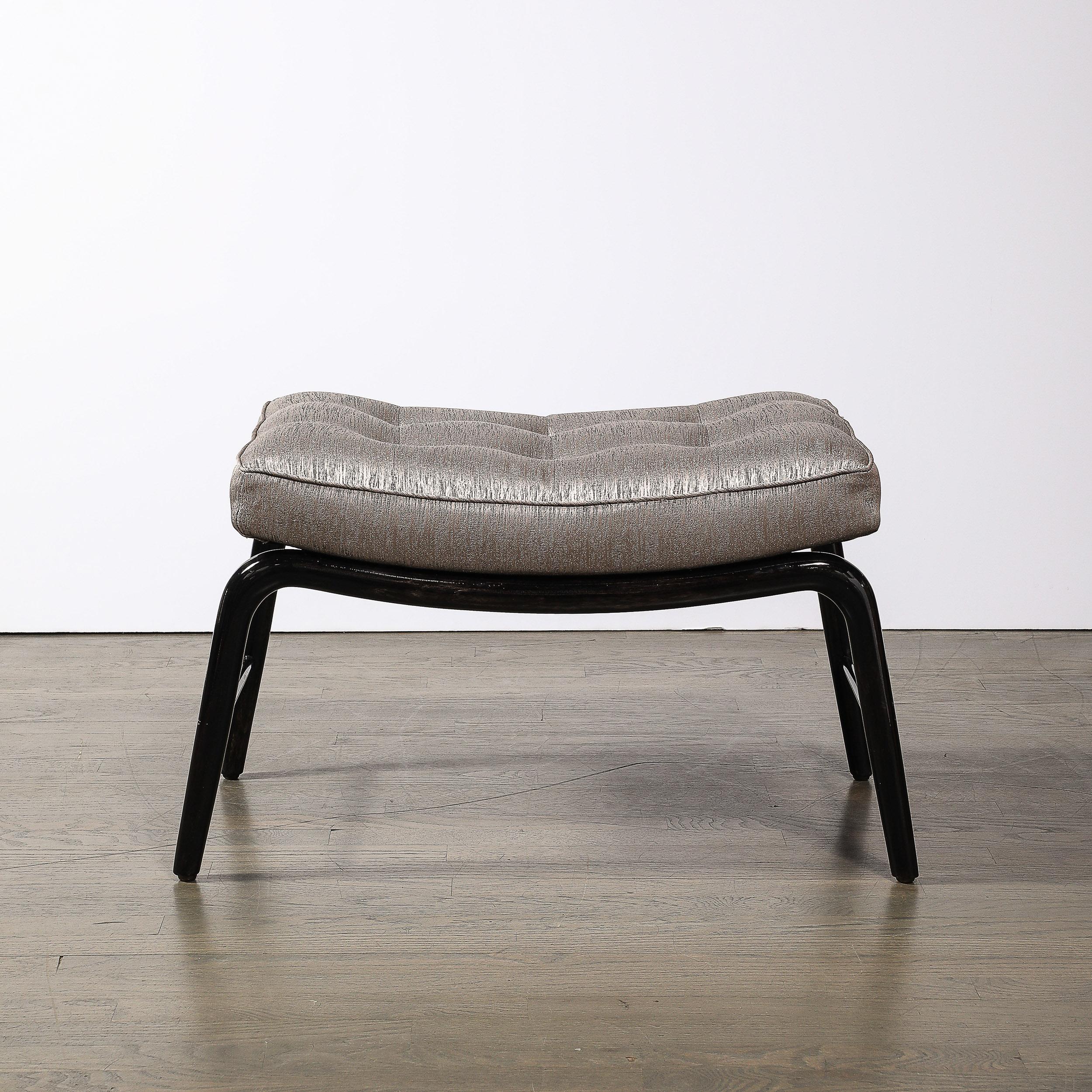 This sleek and well balanced Mid-Century Modernist Splayed Leg Sculptural bench  W/Button Detailing in Ebonized Walnut W/ Silver Linear Fabric originates from the United States, Circa 1950. Features a cylindrical framework in sculptural walnut with