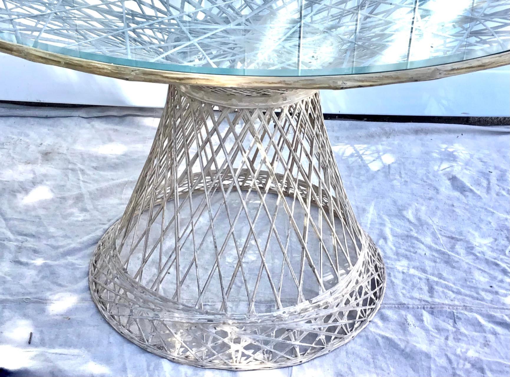 A sculptural spun fiberglass table by Russell Woodard. Made of rigid bands of off-white fiberglass. Would look great indoors or outdoors. Custom beveled glass top included.