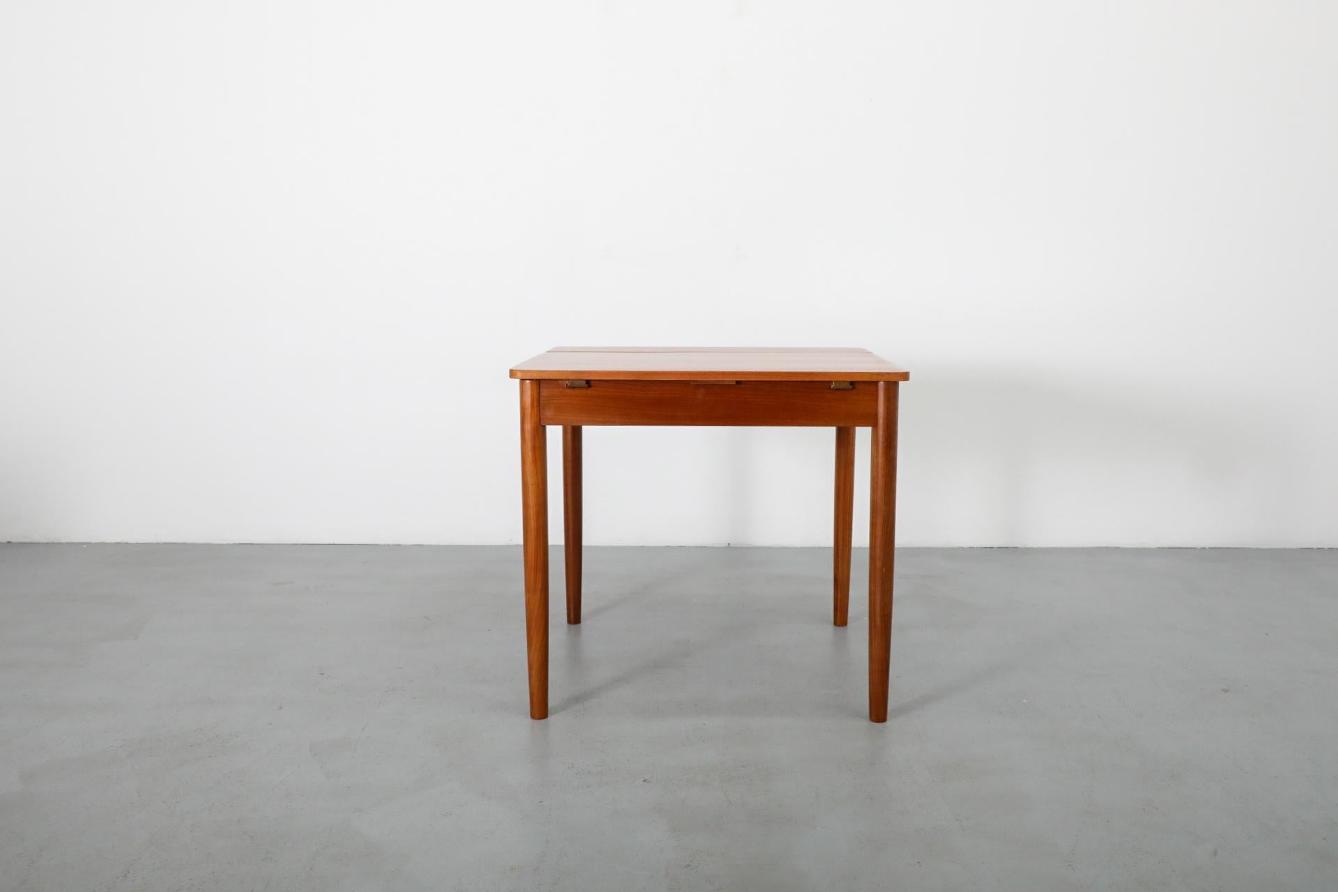 Mid-Century Square Teak Dining Table with Party Leaf and Tapered Legs 4