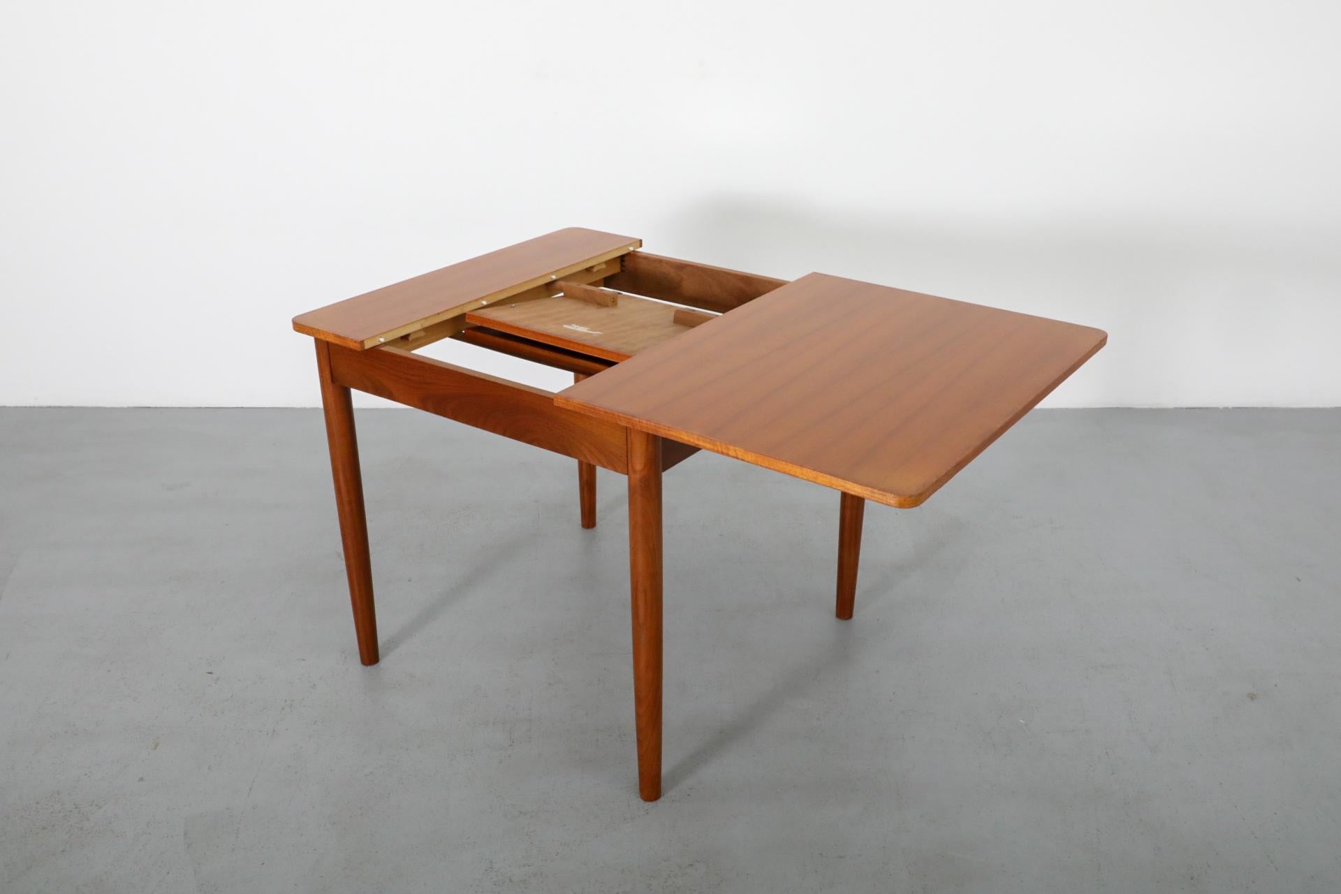 20th Century Mid-Century Square Teak Dining Table with Party Leaf and Tapered Legs