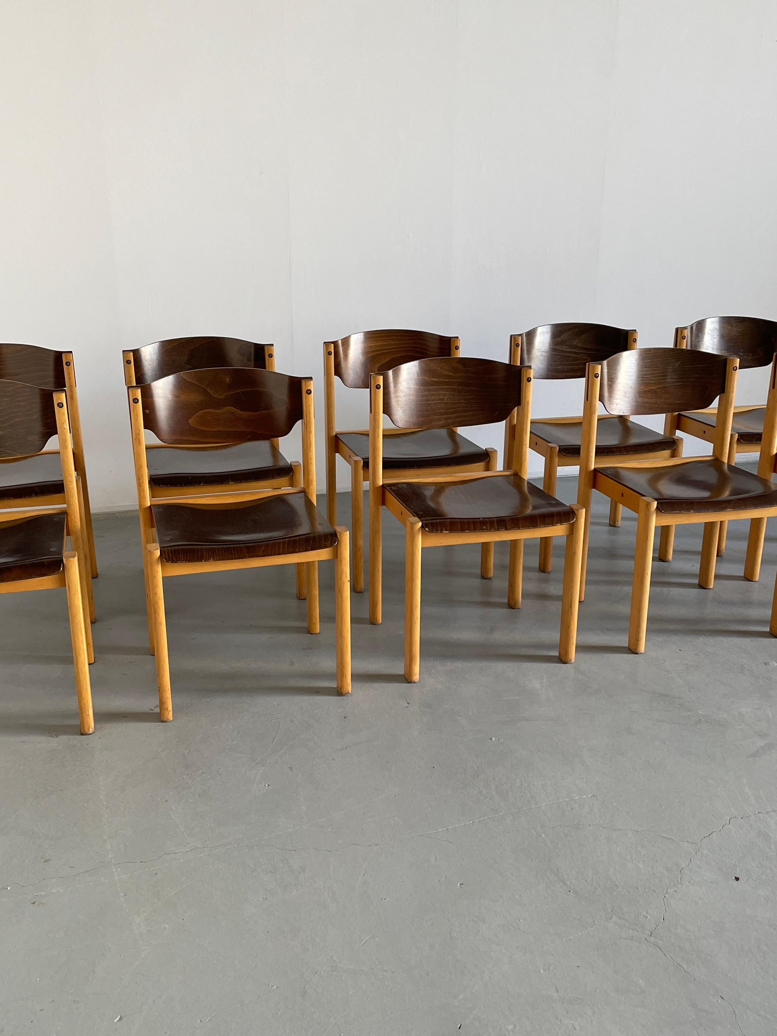 Mid-Century Modern stackable dining chairs or visitor chairs in beechwood and stained plywood, following the style of Rolan Rainer, produced in the early 1970s in West Germany.
High production quality.

40 pieces available.

Original vintage