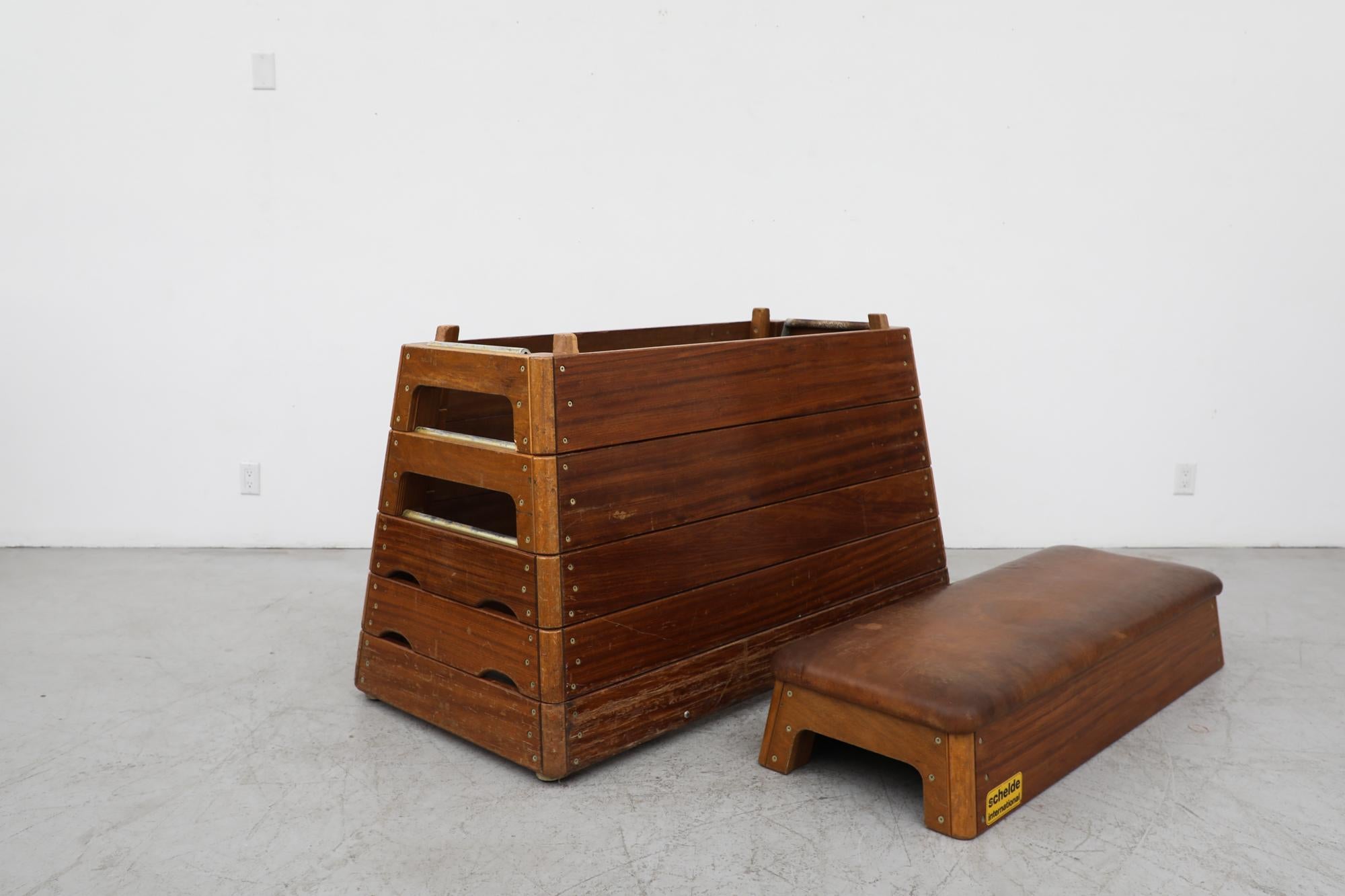 Mid Century  Stacked Oak & Teak Brown Leather Topped Rolling Gymnastics Bench In Good Condition For Sale In Los Angeles, CA