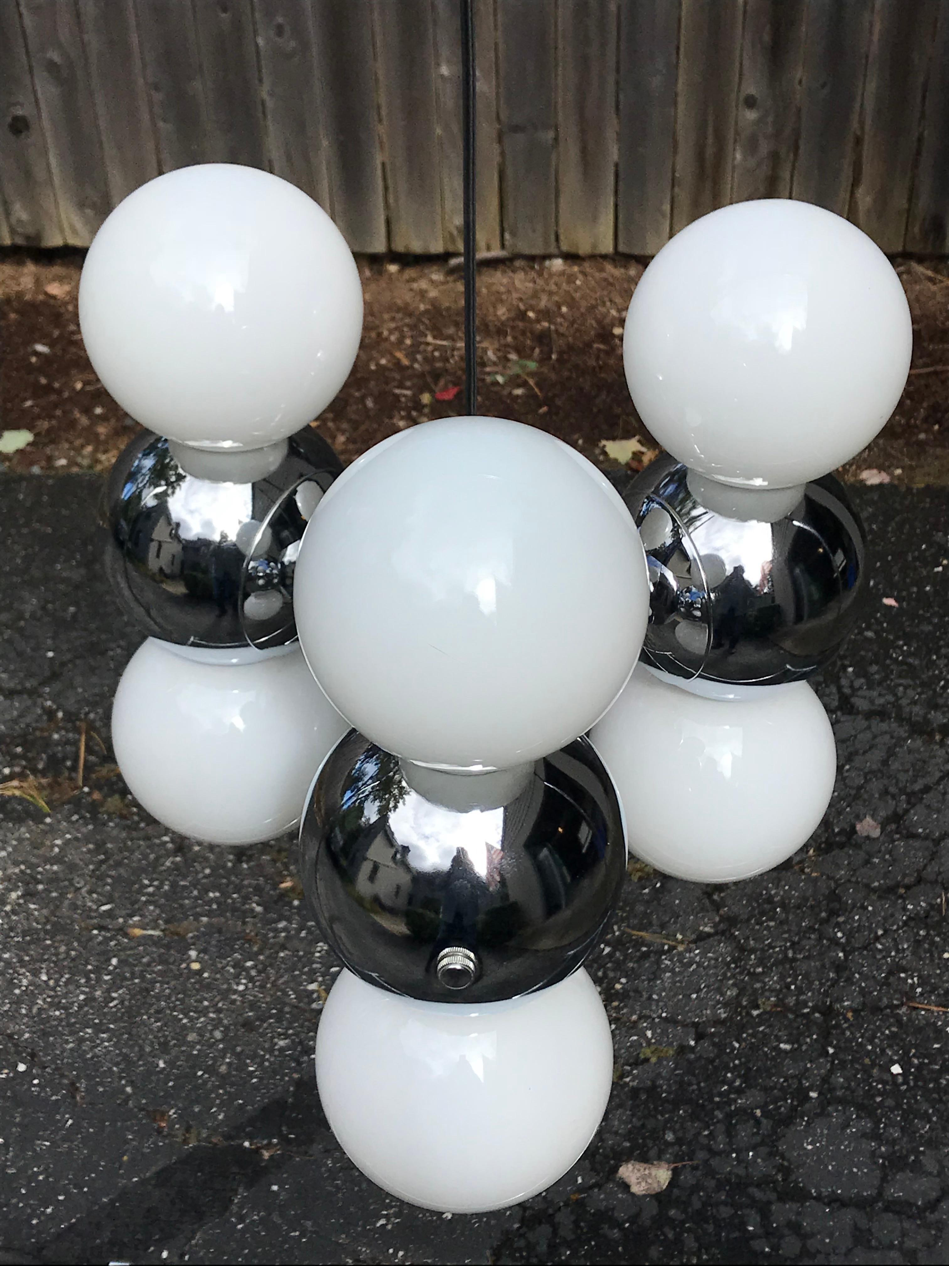 Funky chrome six bulb pendant light, maker unknown, 1970s

60W bulbs not included.