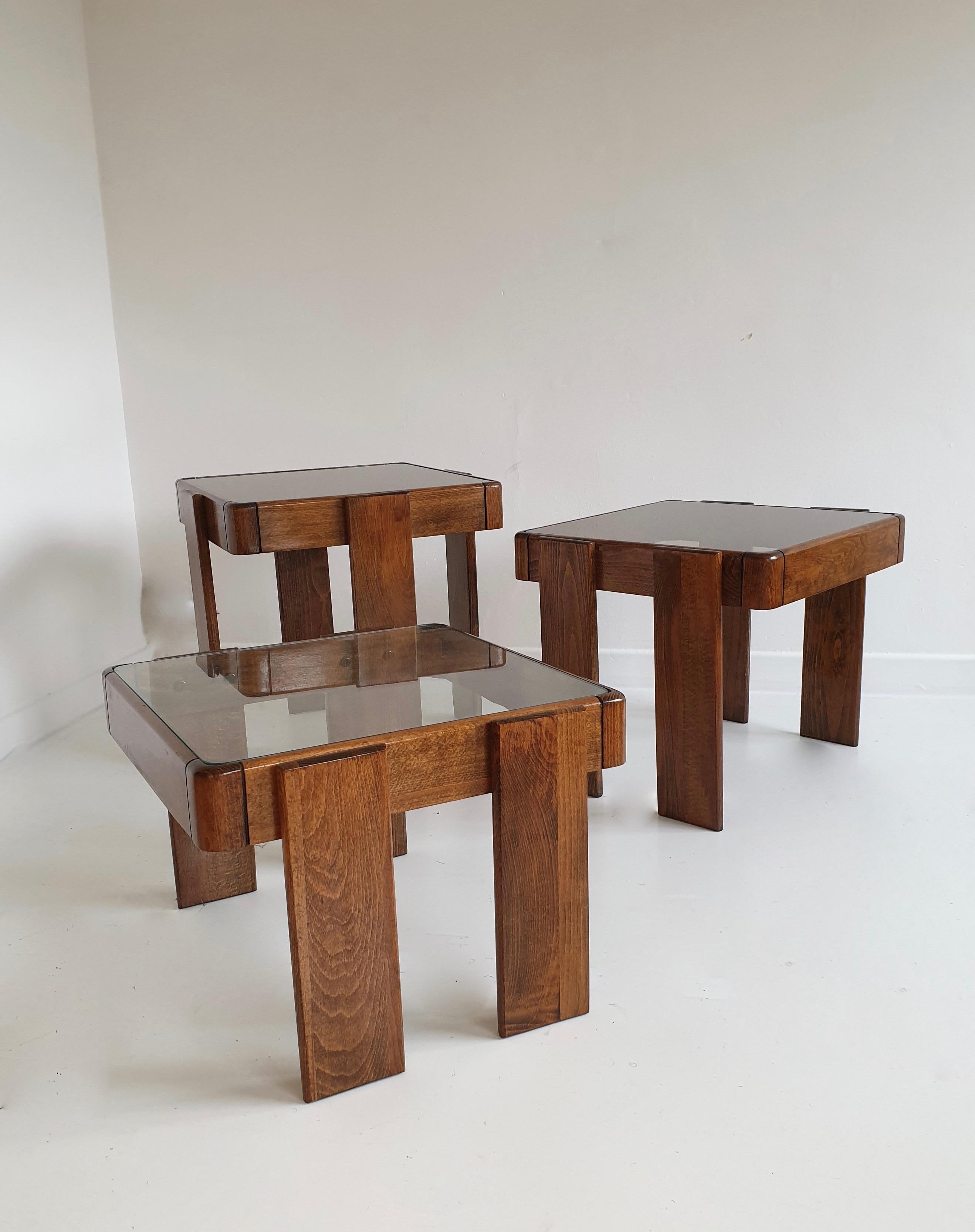 Superb wooden stacking side tables with glass tops, designed by Gianfranco Frattini for Cassina, circa 1960.