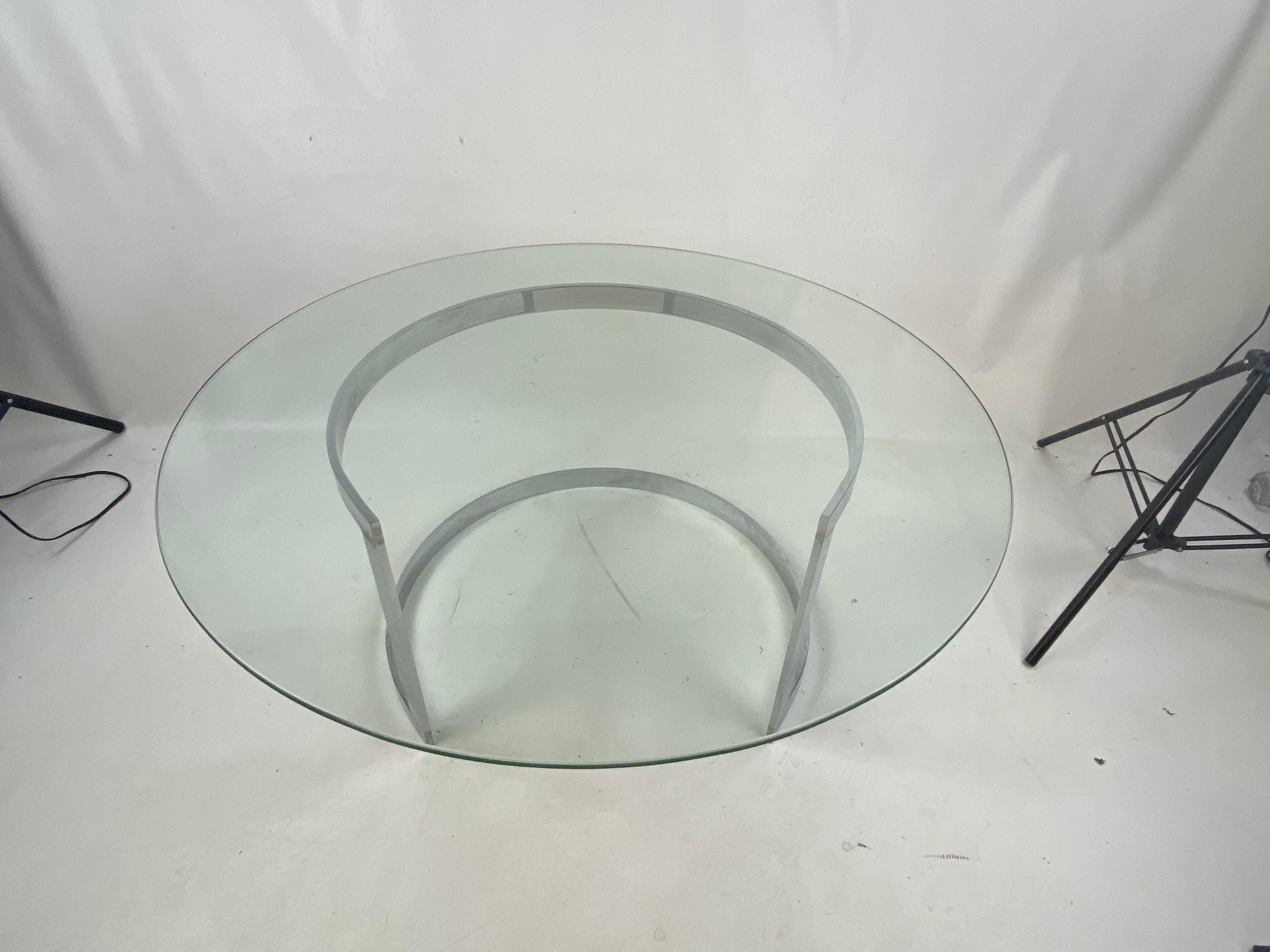 Midcentury stainless steel crescent coffee table attributed to Milo Baughman.