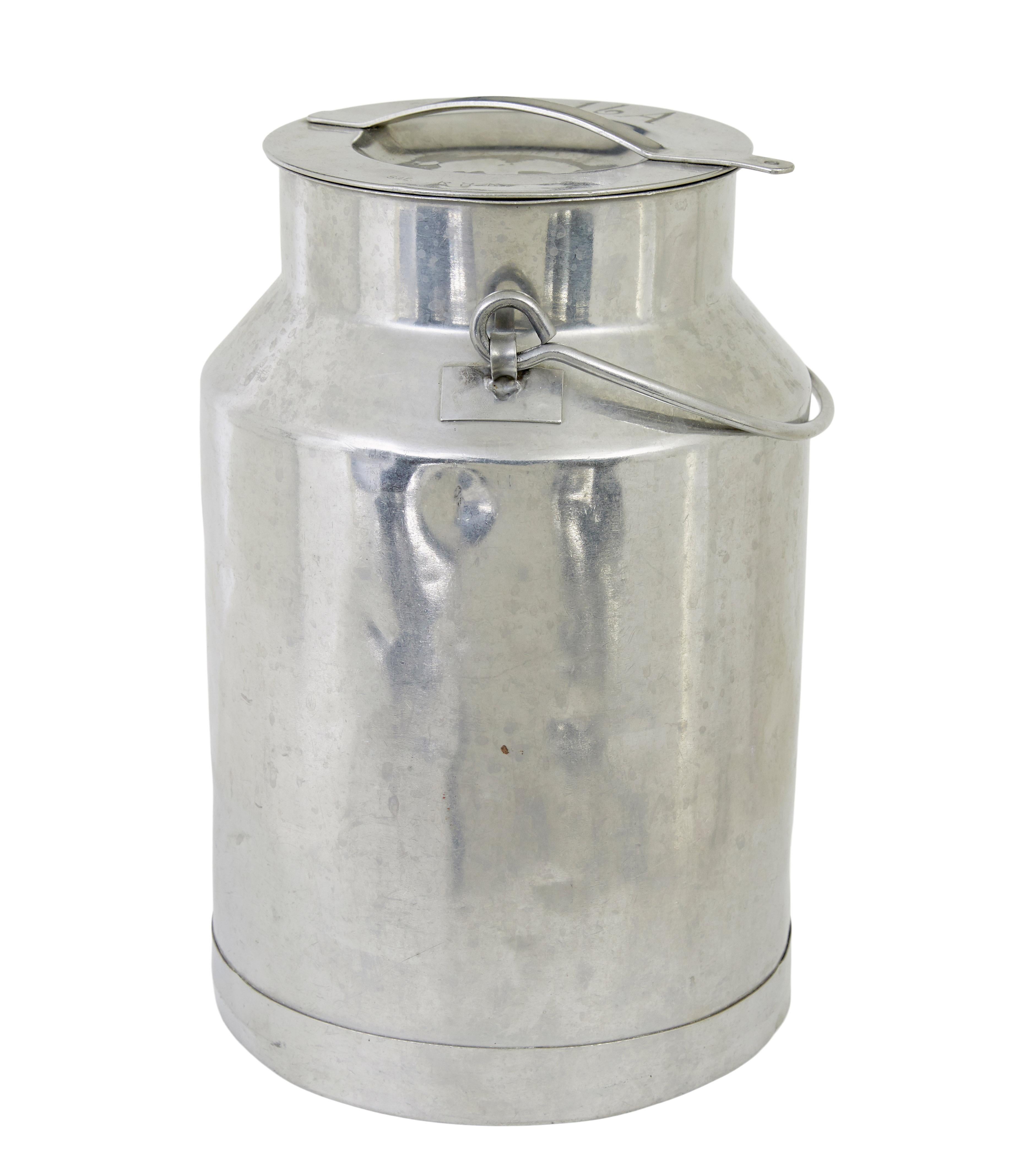 Mid century stainless steel storage vessel circa 1940.

Good quality decorative piece, with applied stainless handle, and removable with etched numerals.  Perfect for kitchen decoration or for dry good storage.

Expected minor dings to metalwork.