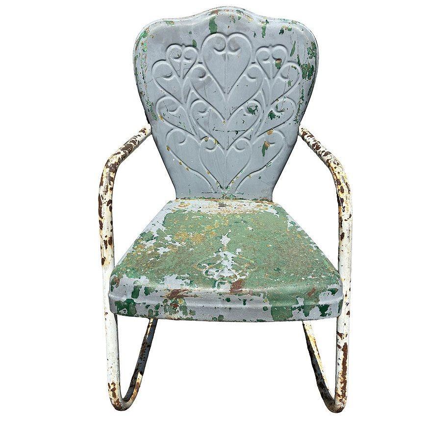 Steel Mid-century Springer Outdoor grey and green enamel Lounge Chair. The chair features a round tubular U-shaped base that rocks and forth when pushed back and forth. The chair features a scrolling pressed steel seat back with a lined pattern in