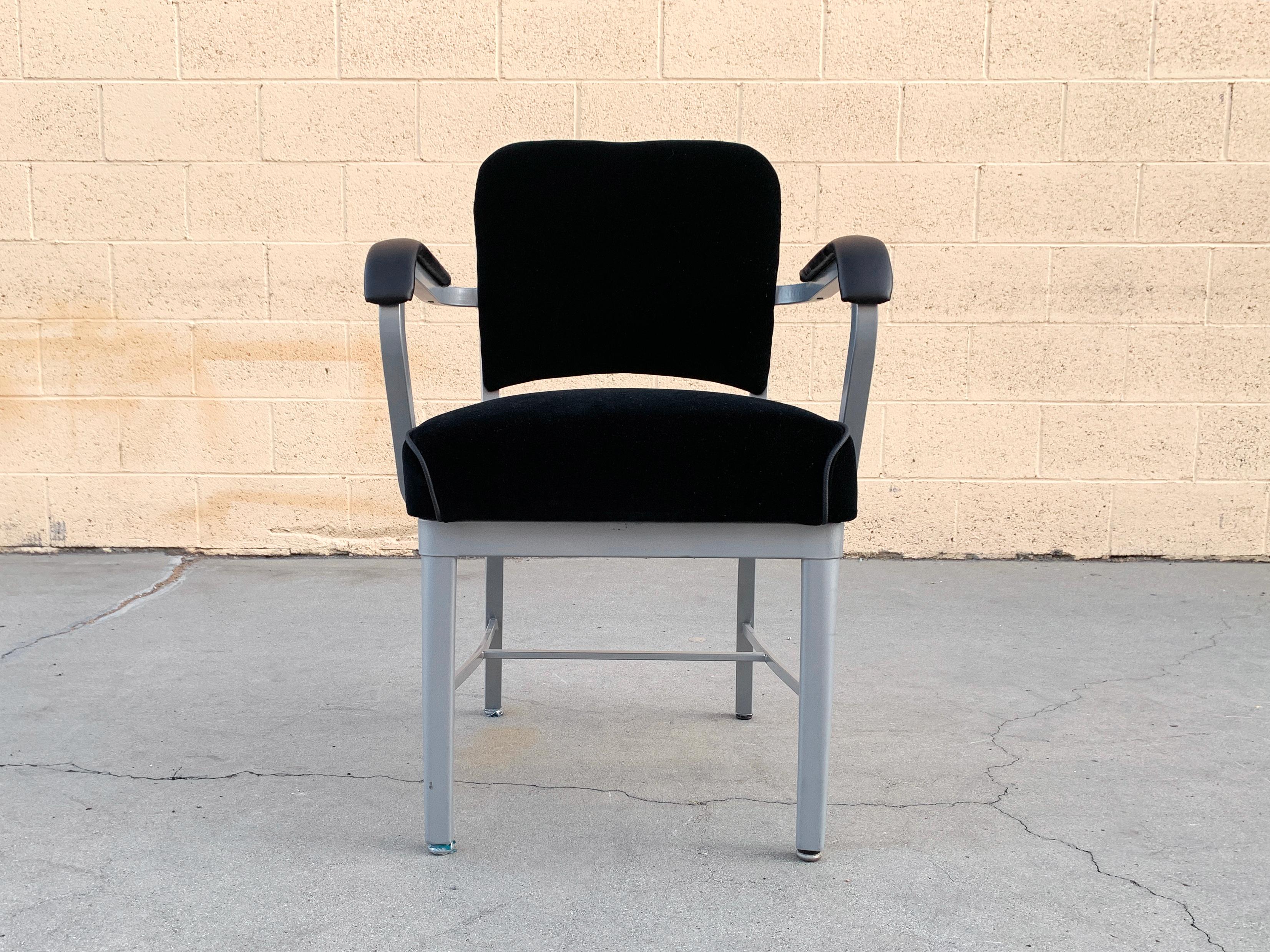 Classic midcentury steel tanker armchair refinished in metallic silver powder-coated frame (Bengal Silver) and upholstered in black velvet with black leather arms. Most likely attributed to Steelcase, circa 1950s. 

Dimensions: 21