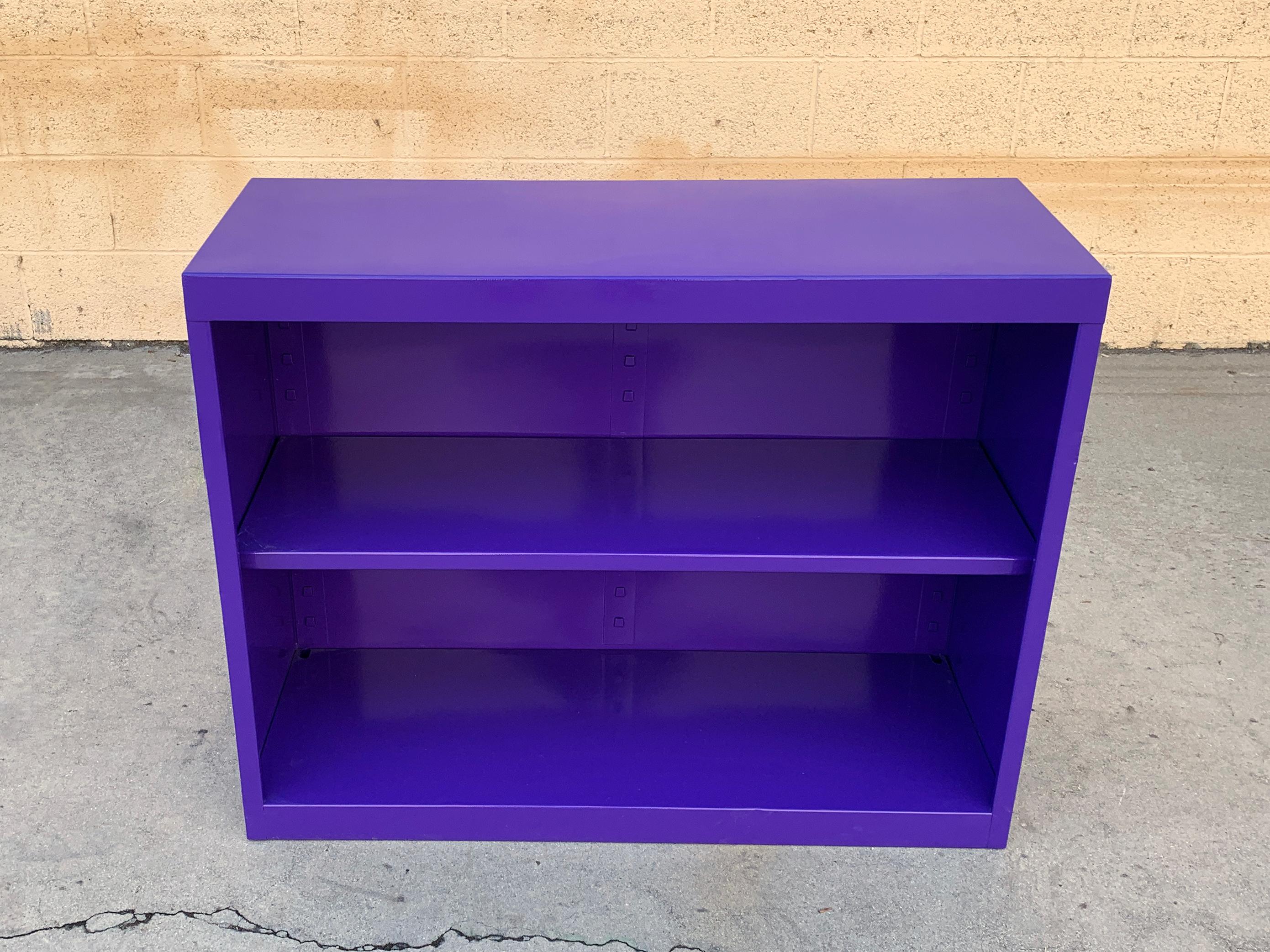 This midcentury tanker bookcase is an uncommon, petit size, ideal for home offices or smaller spaces. Mix and match with all your favorite McDowell Craig and all steel accessories!

Newly refinished in gloss purple with minimal wear to steel.