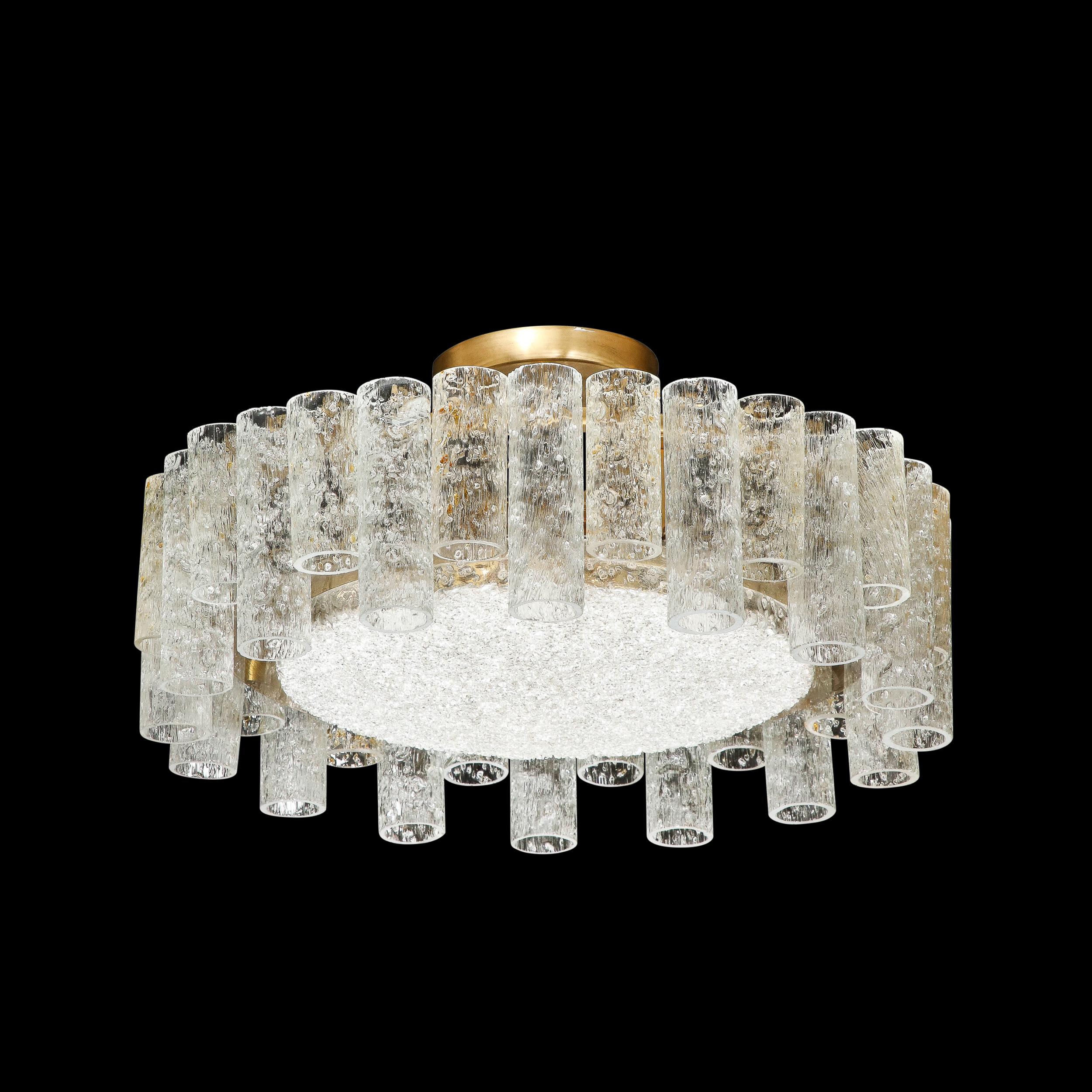 This classic and elegant Mid-Century Modernist Flush Mount Chandelier by Doria Leuchten originates from Austria, Circa 1960. Featuring a circular mottled glass shade on its undersurface circumsribed with a gleaming ring of brass seperating it from