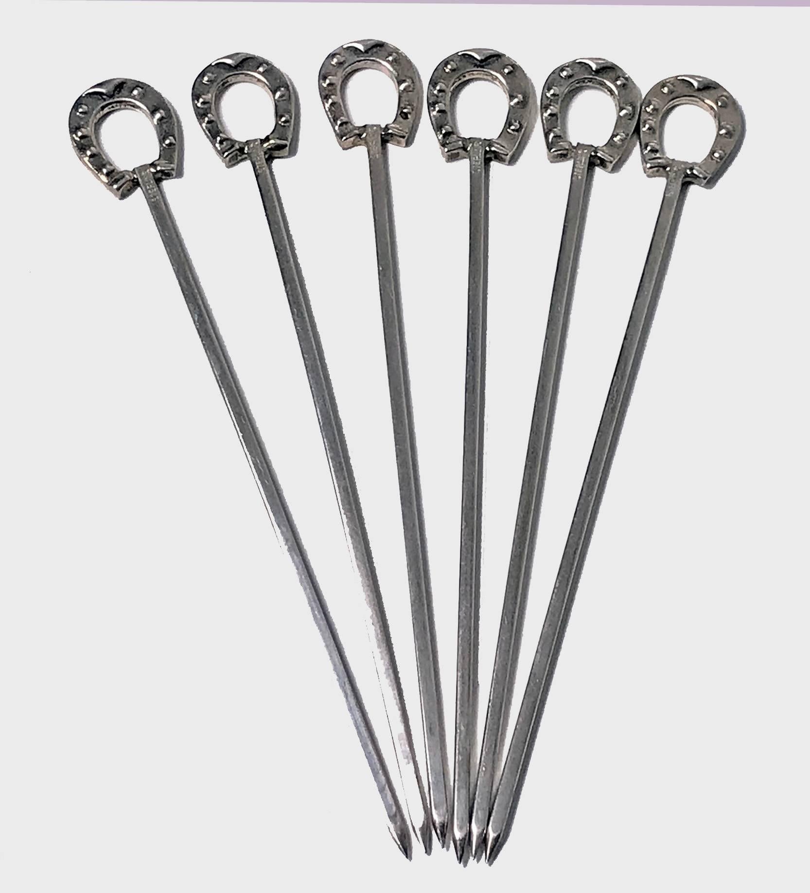 Midcentury sterling silver horseshoe cocktail sticks bar set, import marks for UK. The set in the form of a sterling mounted rosewood horseshoe, allowing for six horseshoe nails each surmounted with a horseshoe. All stamped sterling. Overall