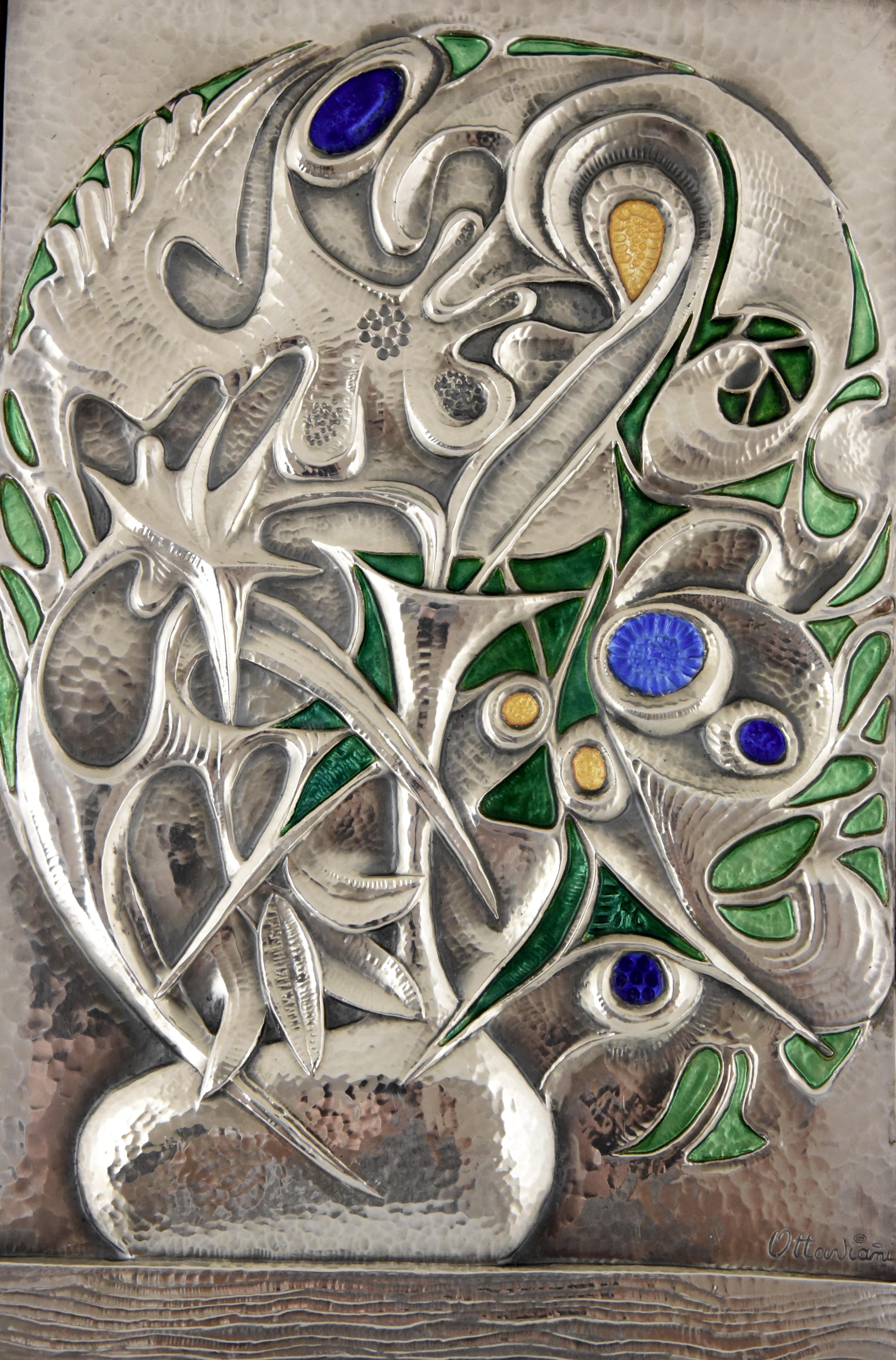 Fine Mid-Century Modern enameled sterling silver wall decoration by the Italian artist Ottaviani picturing a flower vase, in the original wooden frame, ca. 1960.
Signed and with hallmark.
About:
Ottaviani (1945) is a jewelry and silver firm