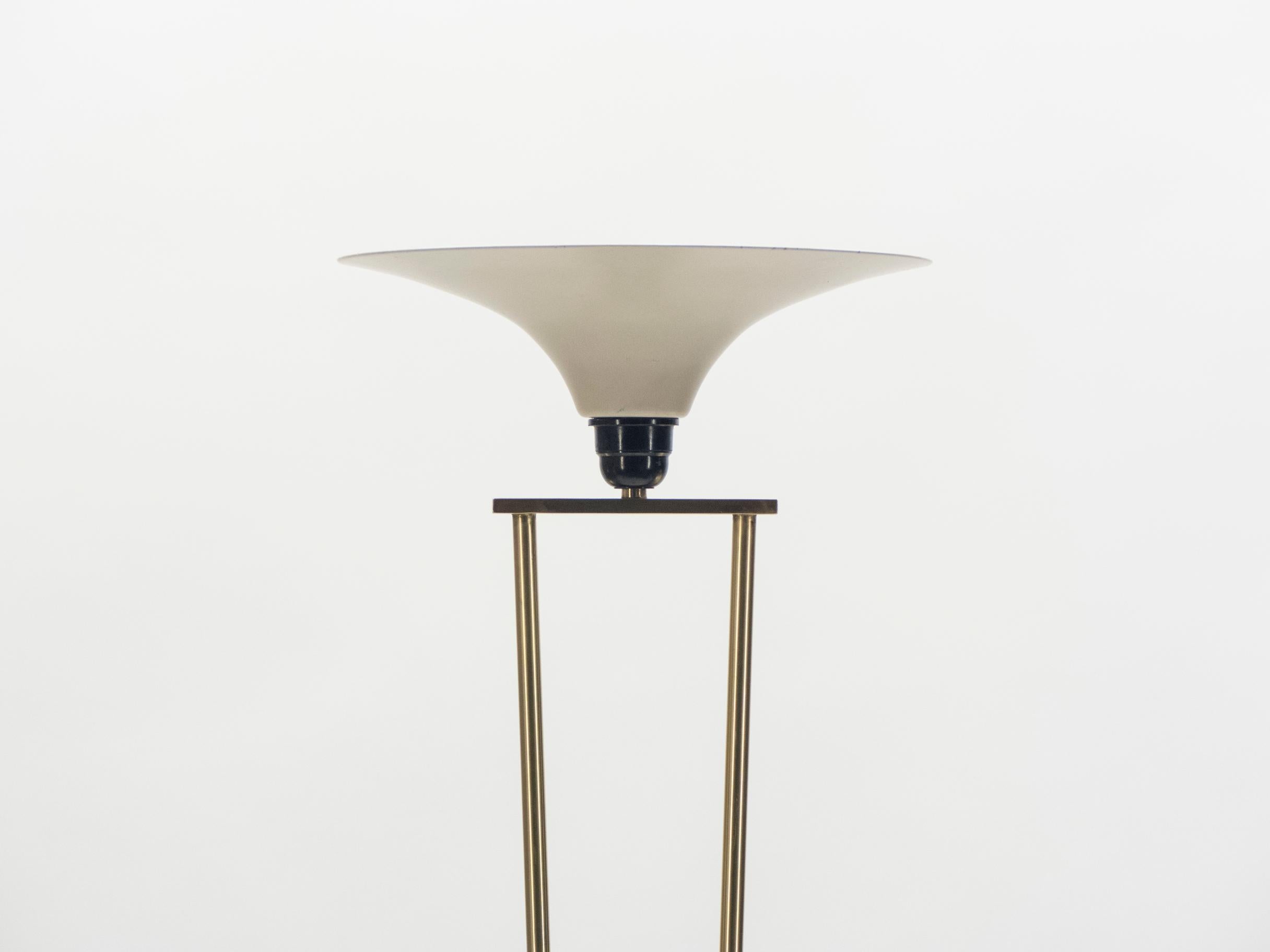 Tall brass legs curve gently into the gorgeous marble base of this midcentury 1960s floor lamp. The lamp covering is made of a milky opaline and has a chic, fluted shape. The overall effect is instantly charming. The high-quality piece is made by