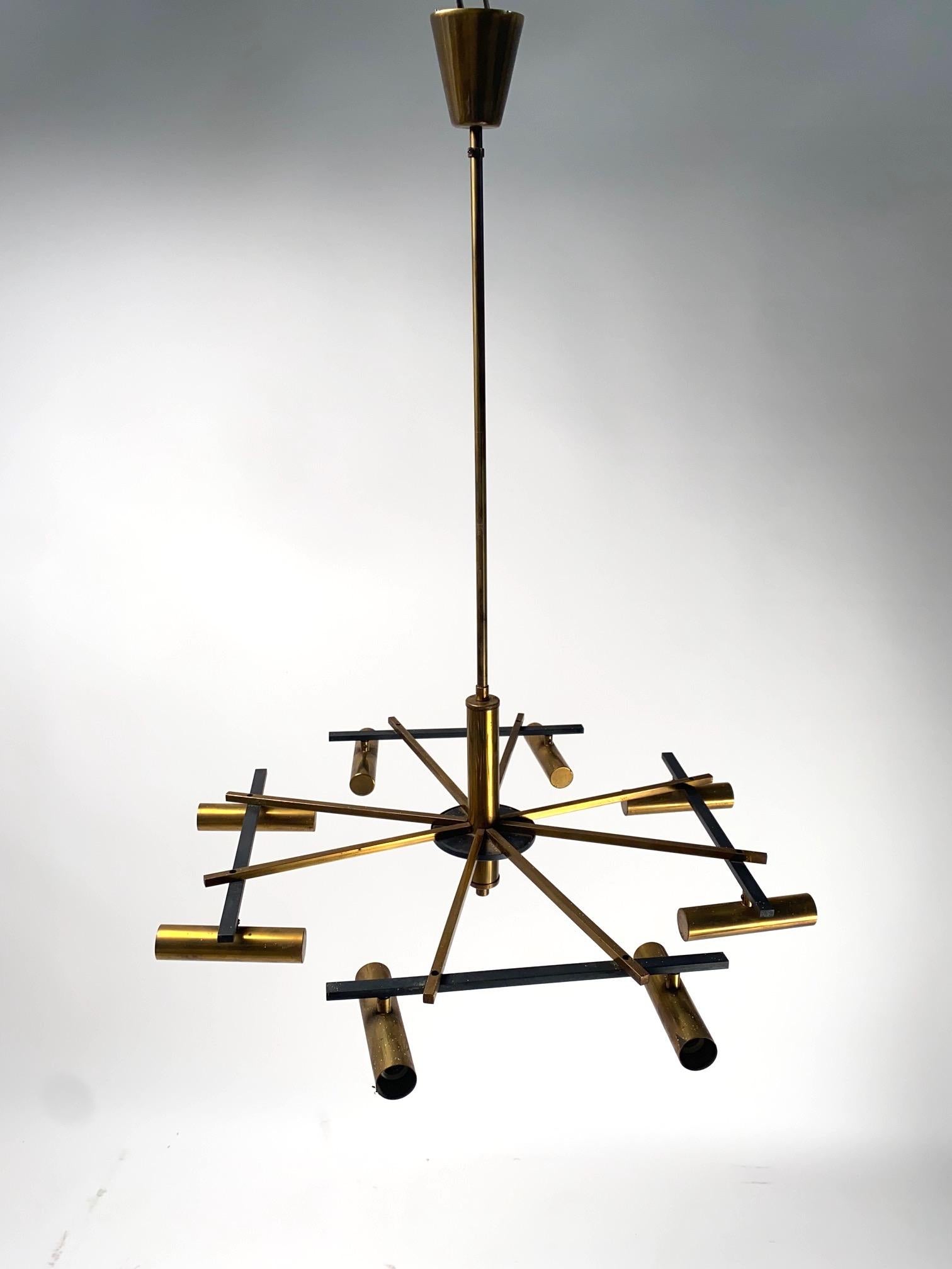 Ceiling Light by Stilnovo (Attr.) Designed and manufactured in Italy,  1950s.

Rare brass and metal chandelier, of great artisan quality, will give a touch of style and refinement to your home environment