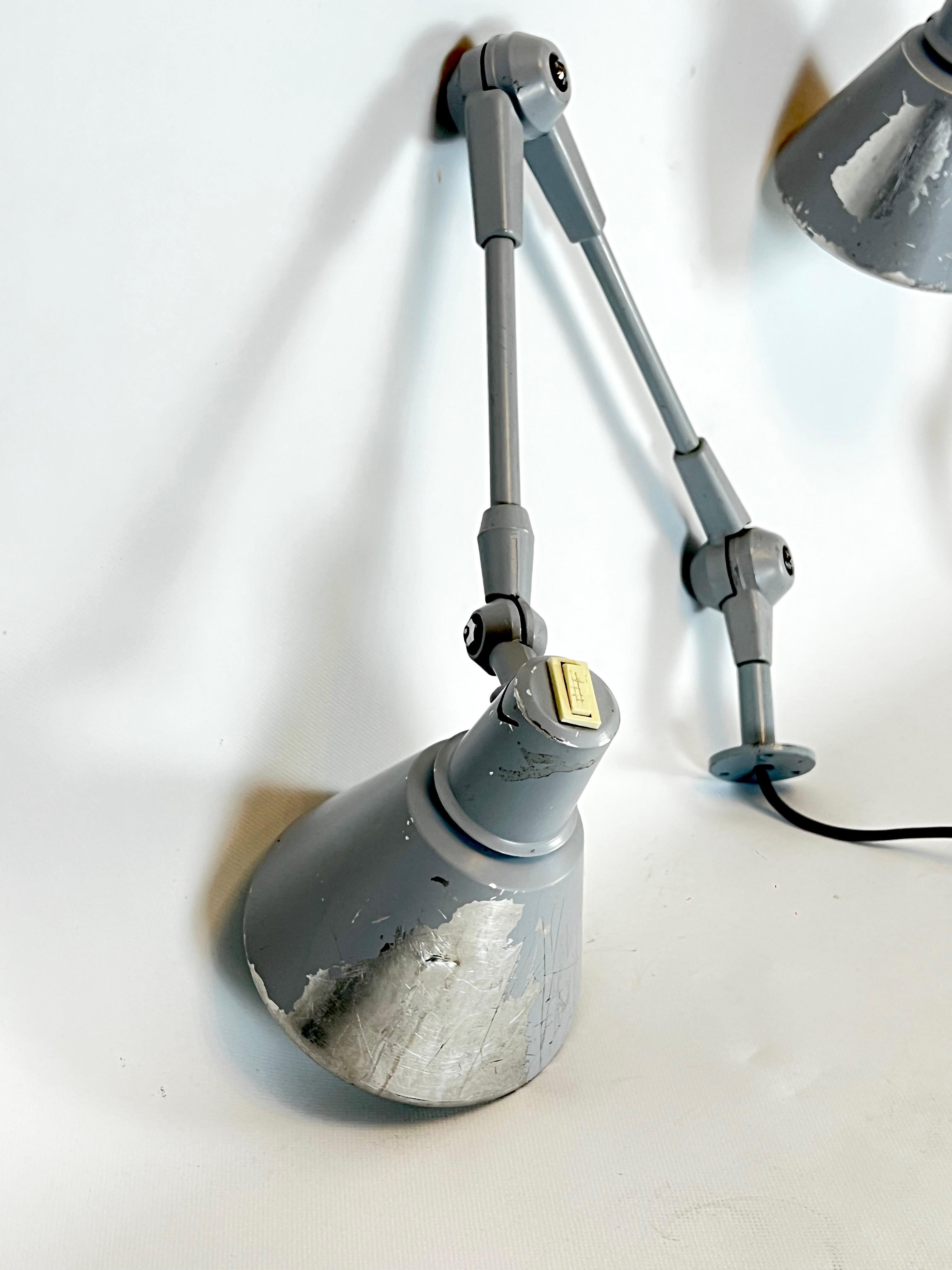 Mid-Century Stilnovo, set of two rare wall lamps in metal. Italy 1960s In Fair Condition For Sale In Catania, CT