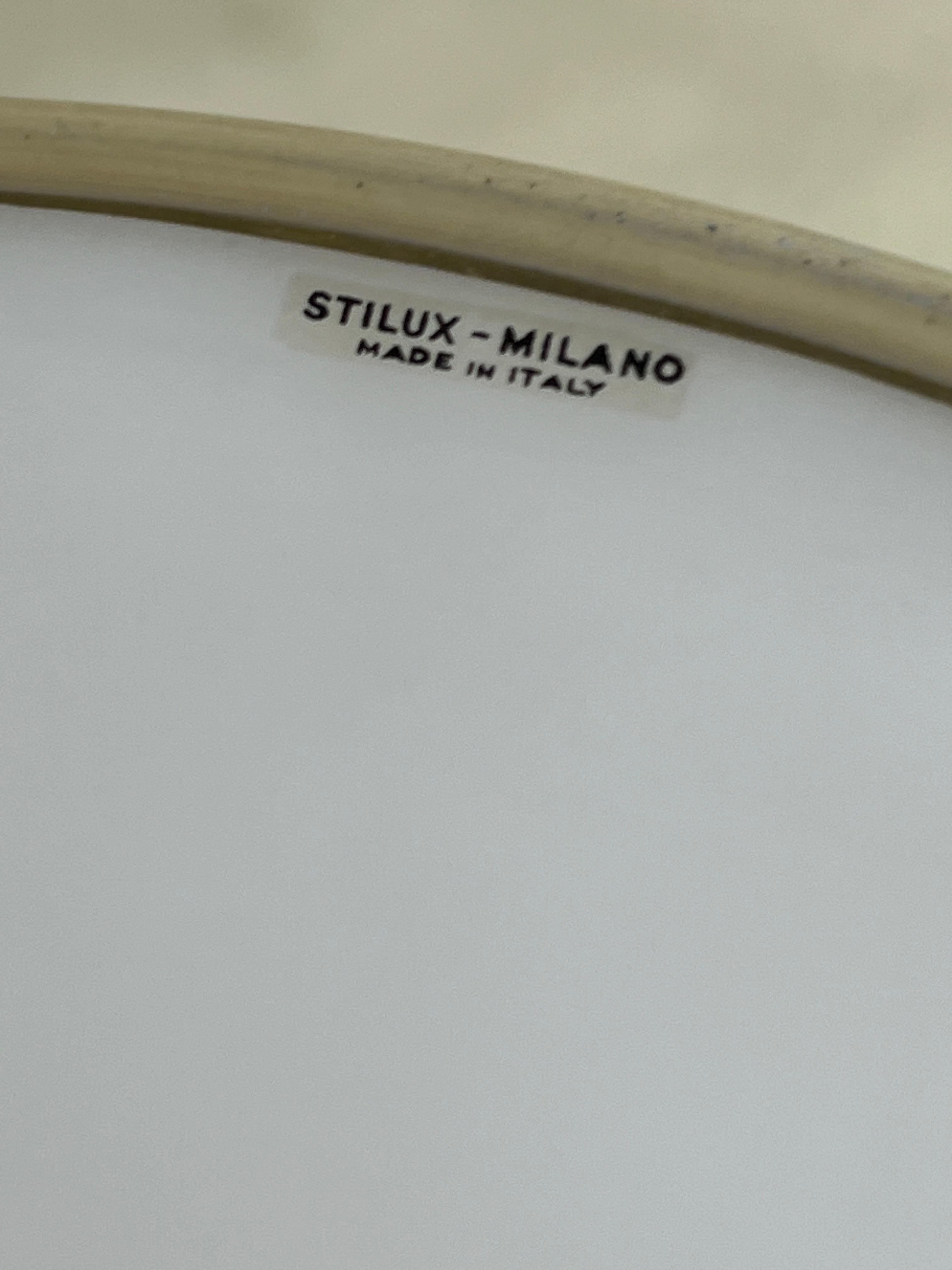 Mid-Century Stilux Milano chandelier in opaline glass, perspex and brass 1960s. 
Intact and in good condition.
It has the attribution mark.